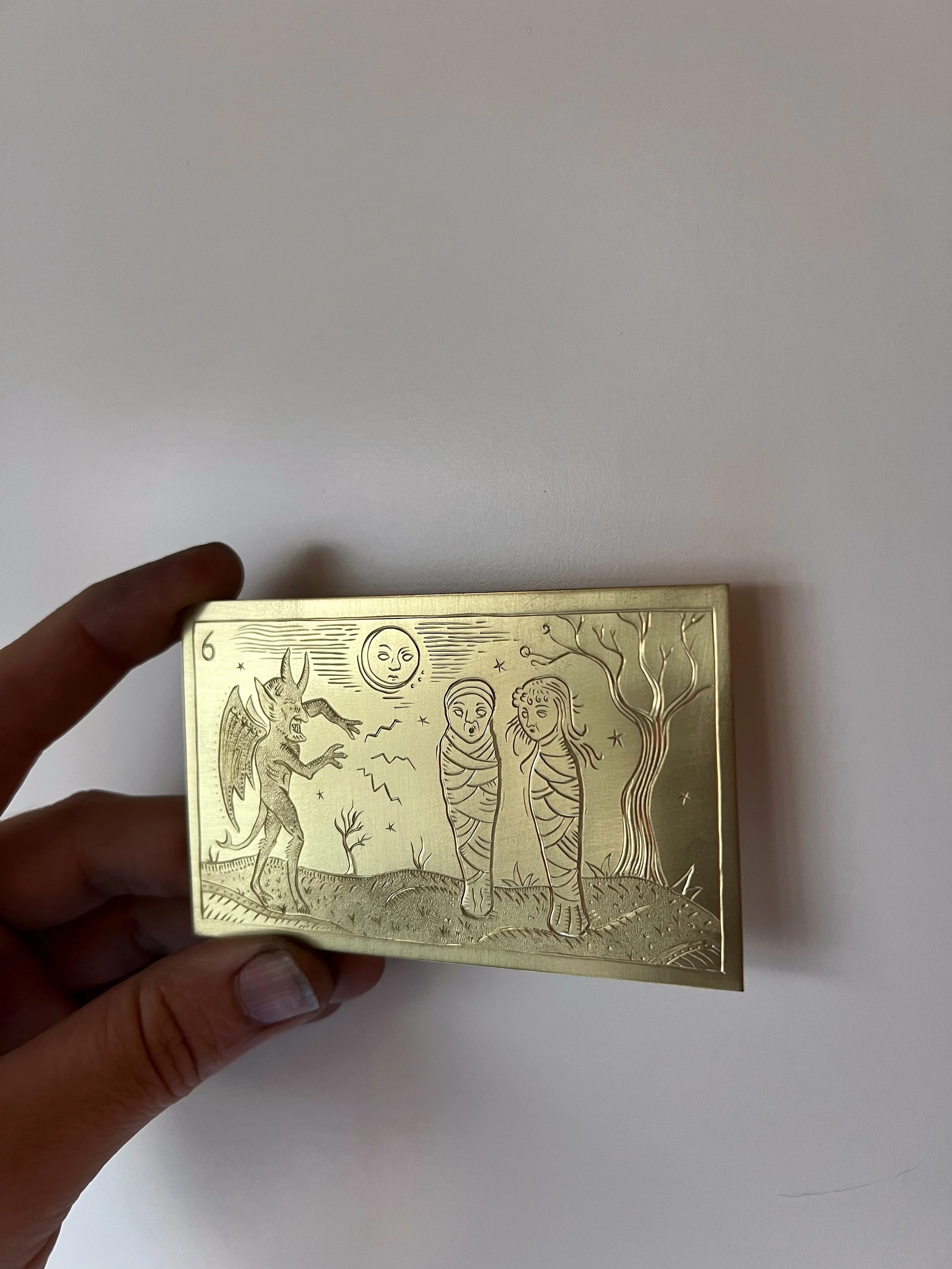 Engraved tarot card