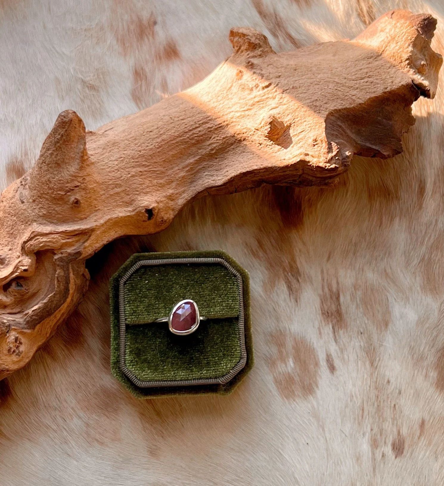 Sterling silver ring with a bezel-set , rose-cut pink Sapphire