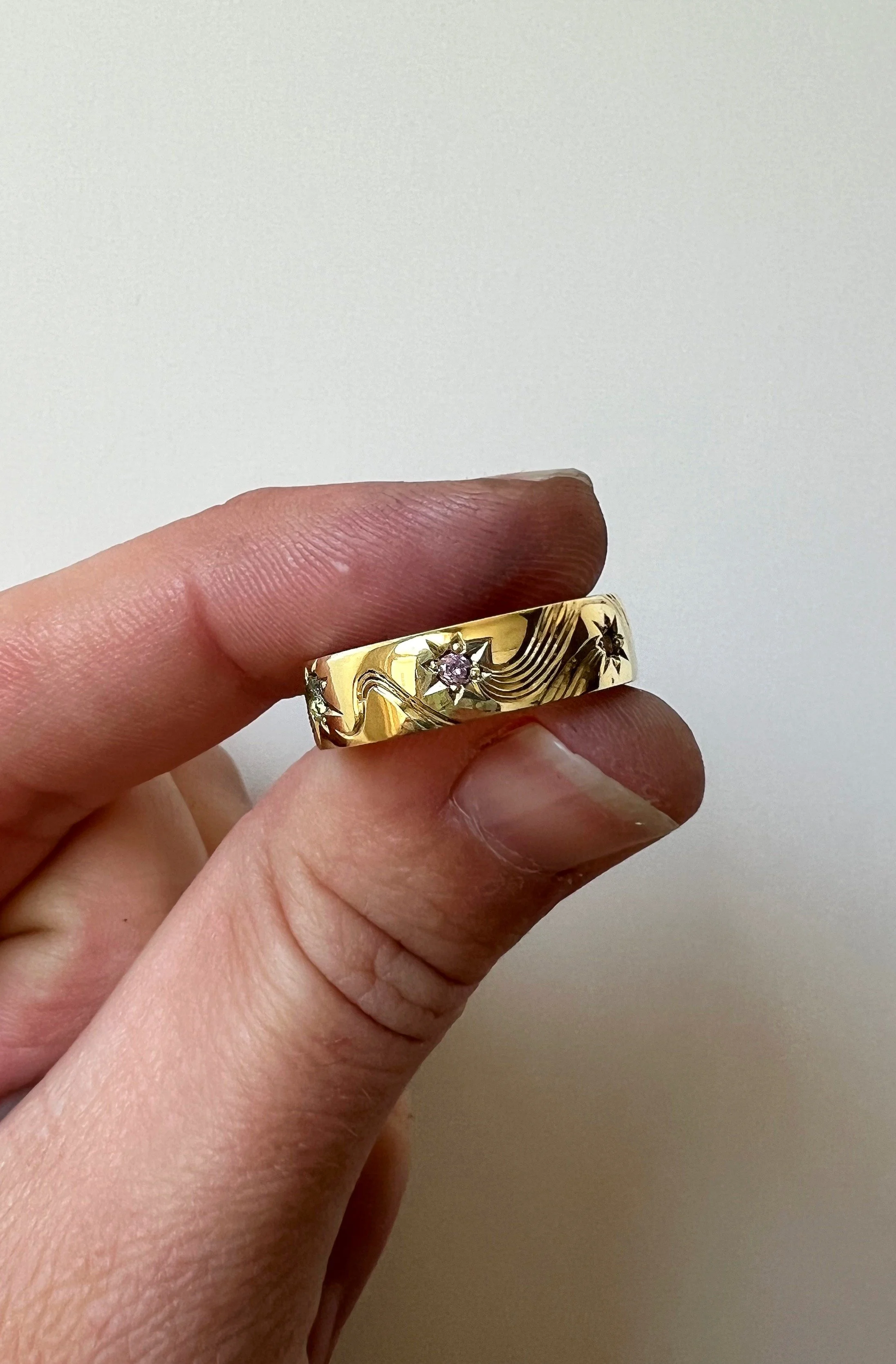 Hand engraved shooting star ring