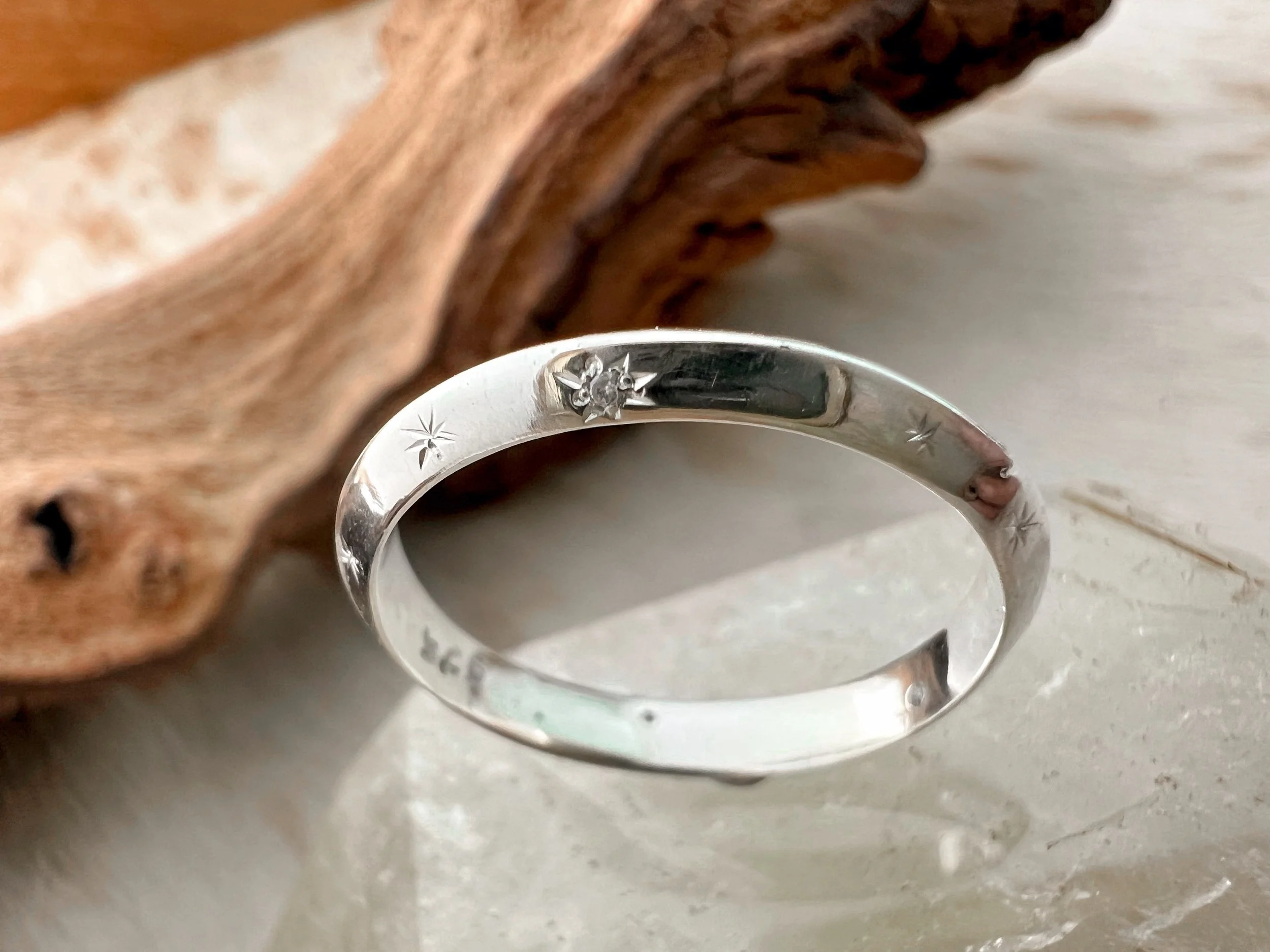 Hand engraved star ring