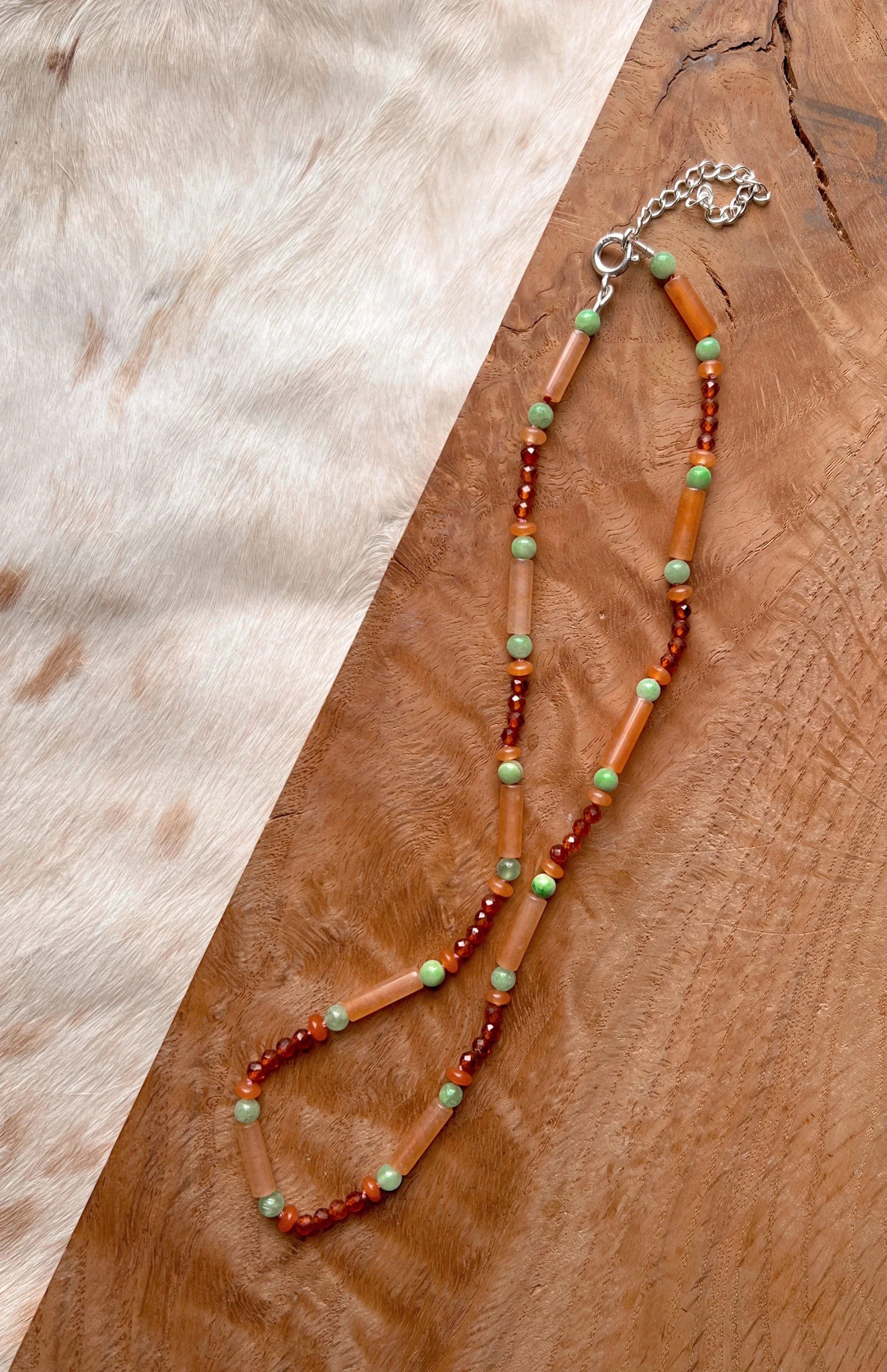 Hand-knotted necklace on pure silk featuring colorful gemstone beads
