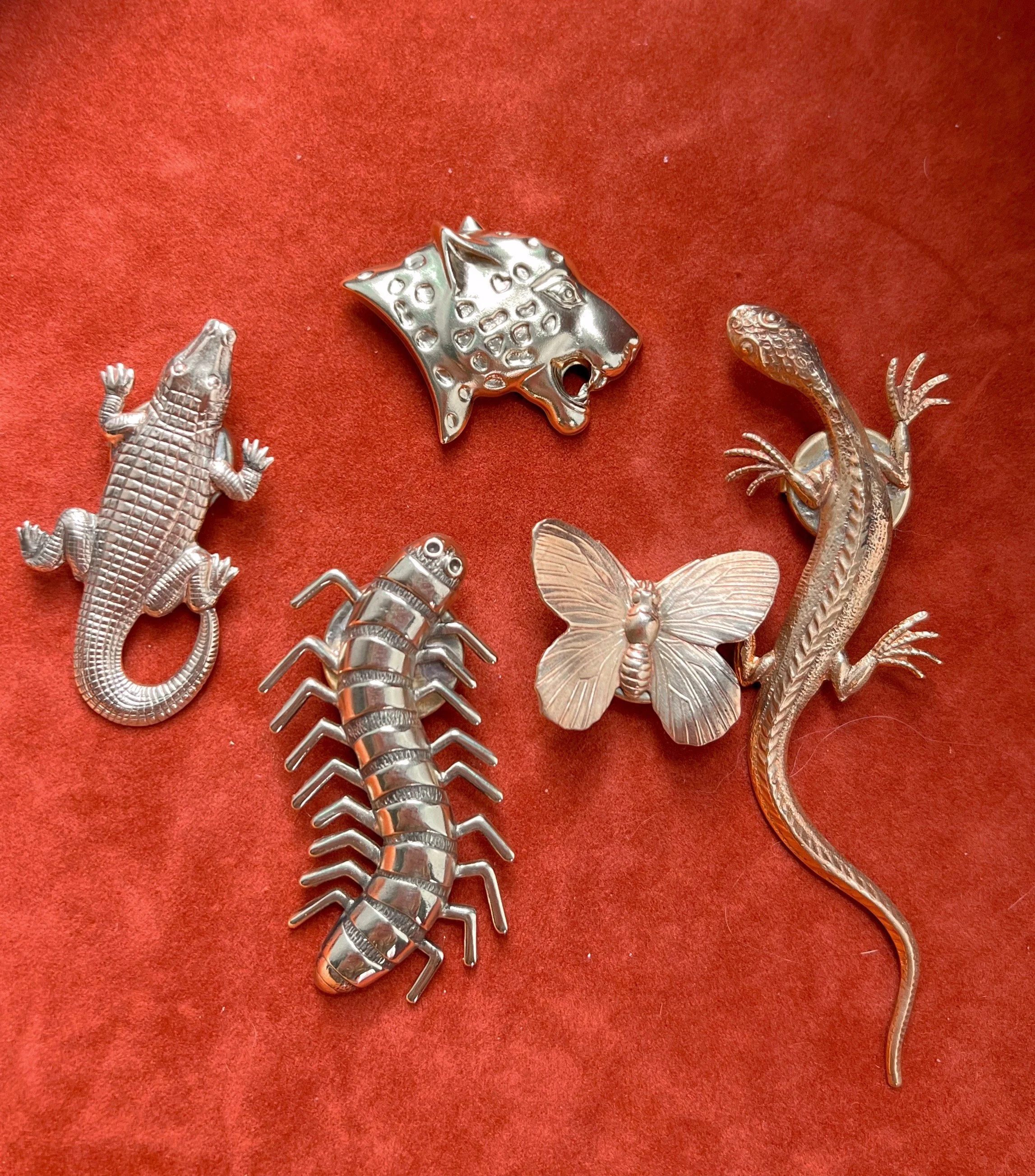 Brass button covers, animals