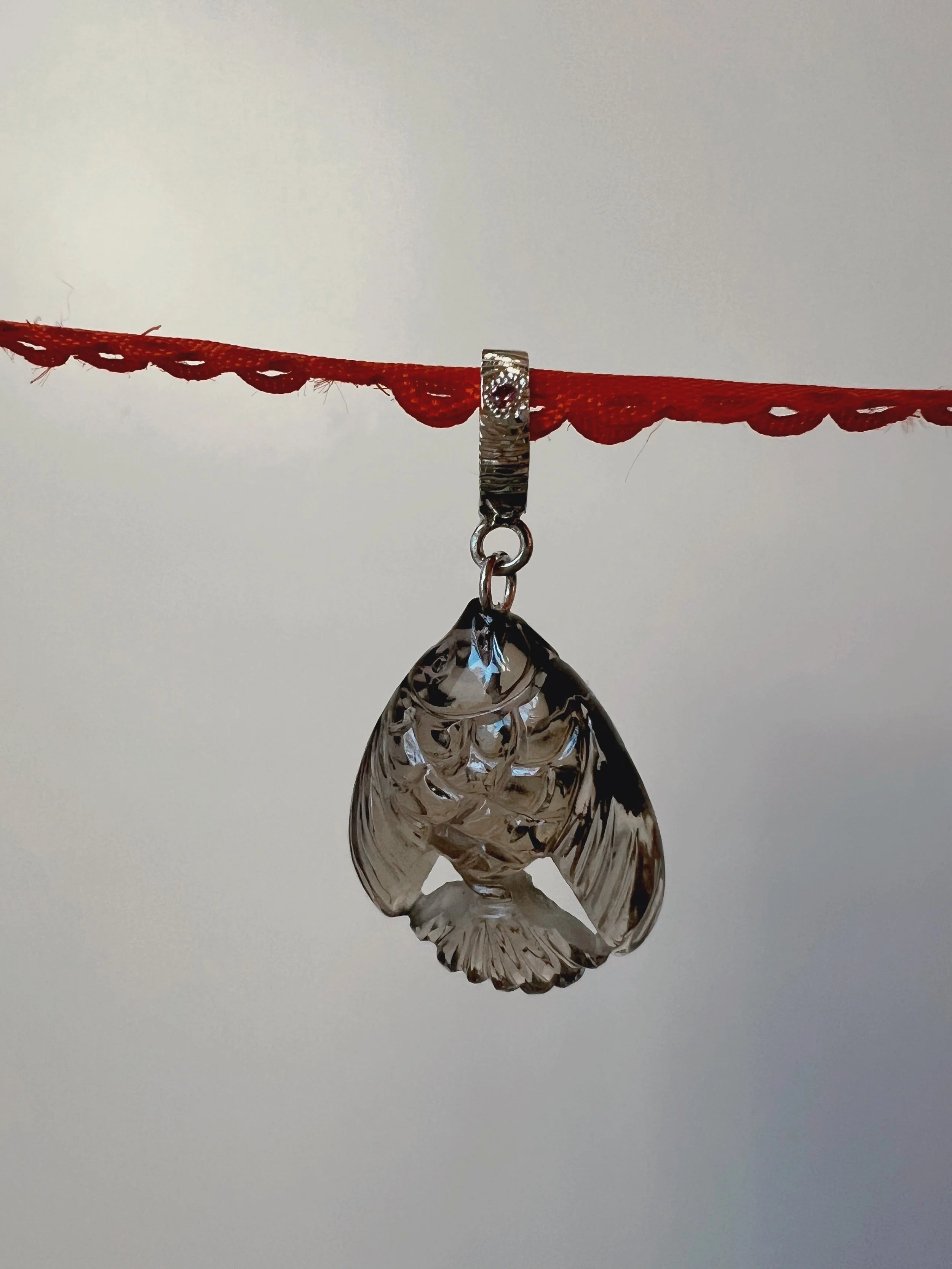 gemstone fish pendant