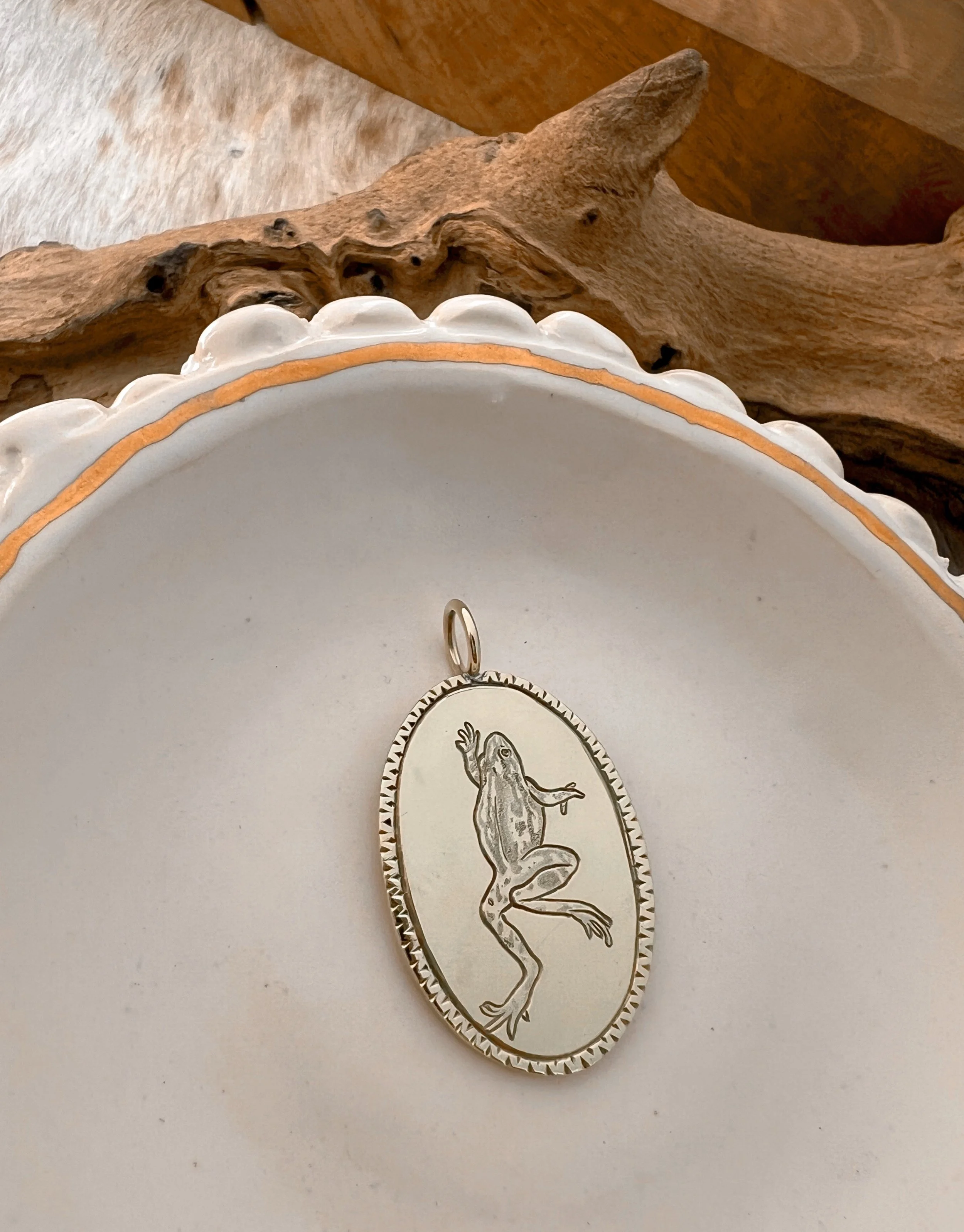 Engraved frog pendant