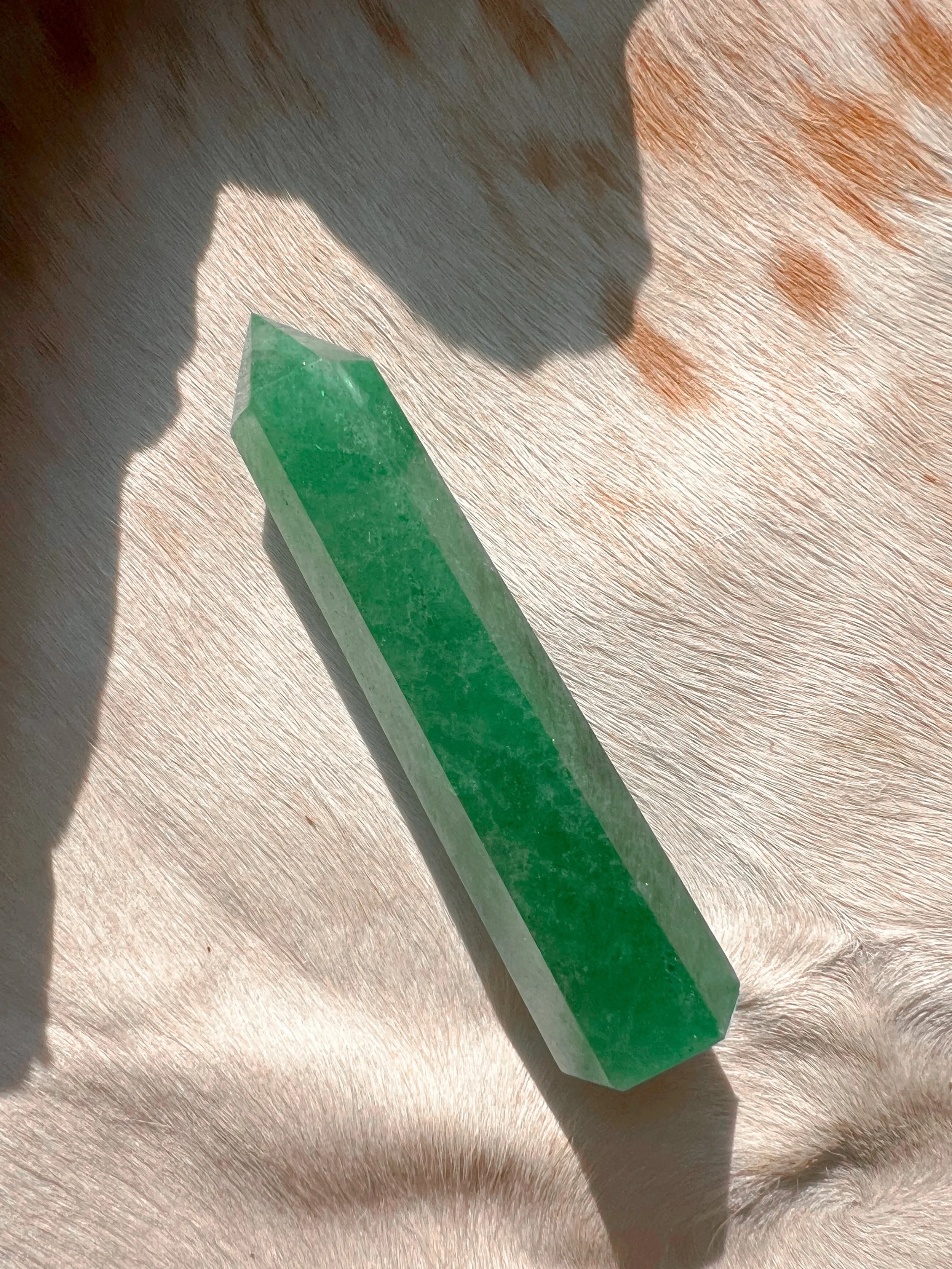 Natural gemstone tower, strawberry quartz