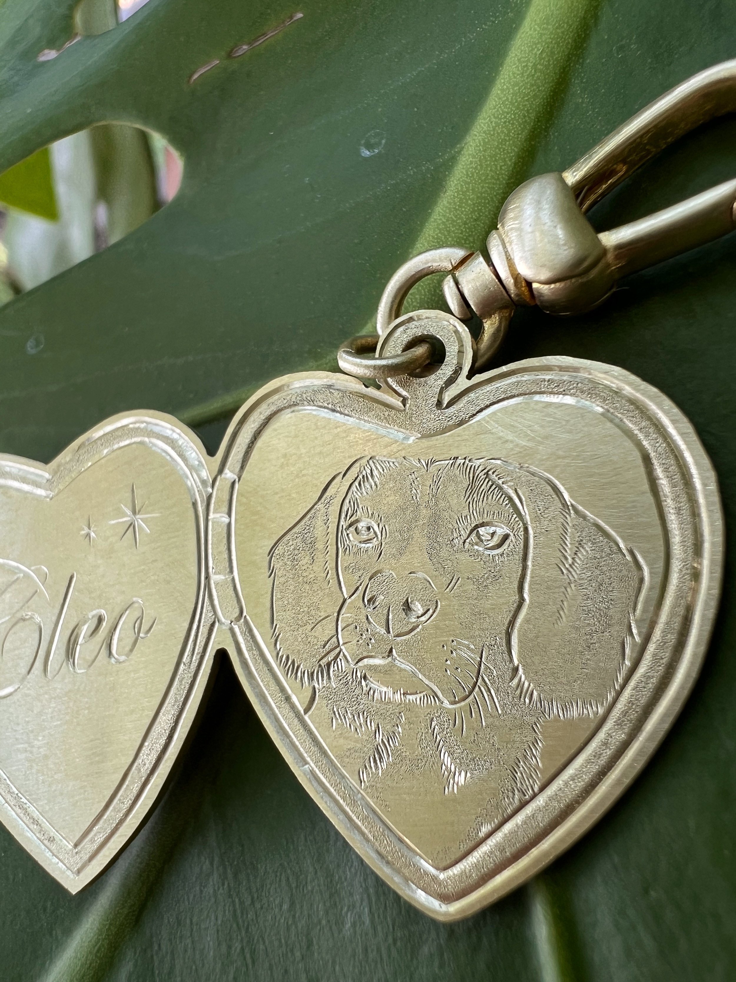 Customized brass "locket" with a detailed pet portrait engraving and script name