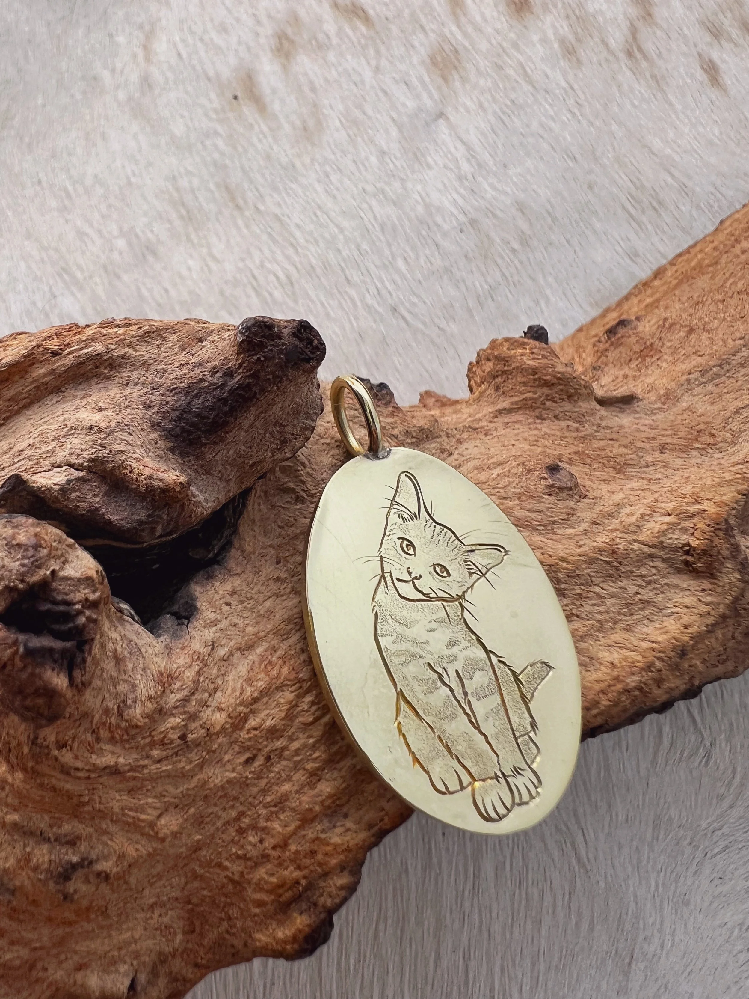 hand engraved cat pendant