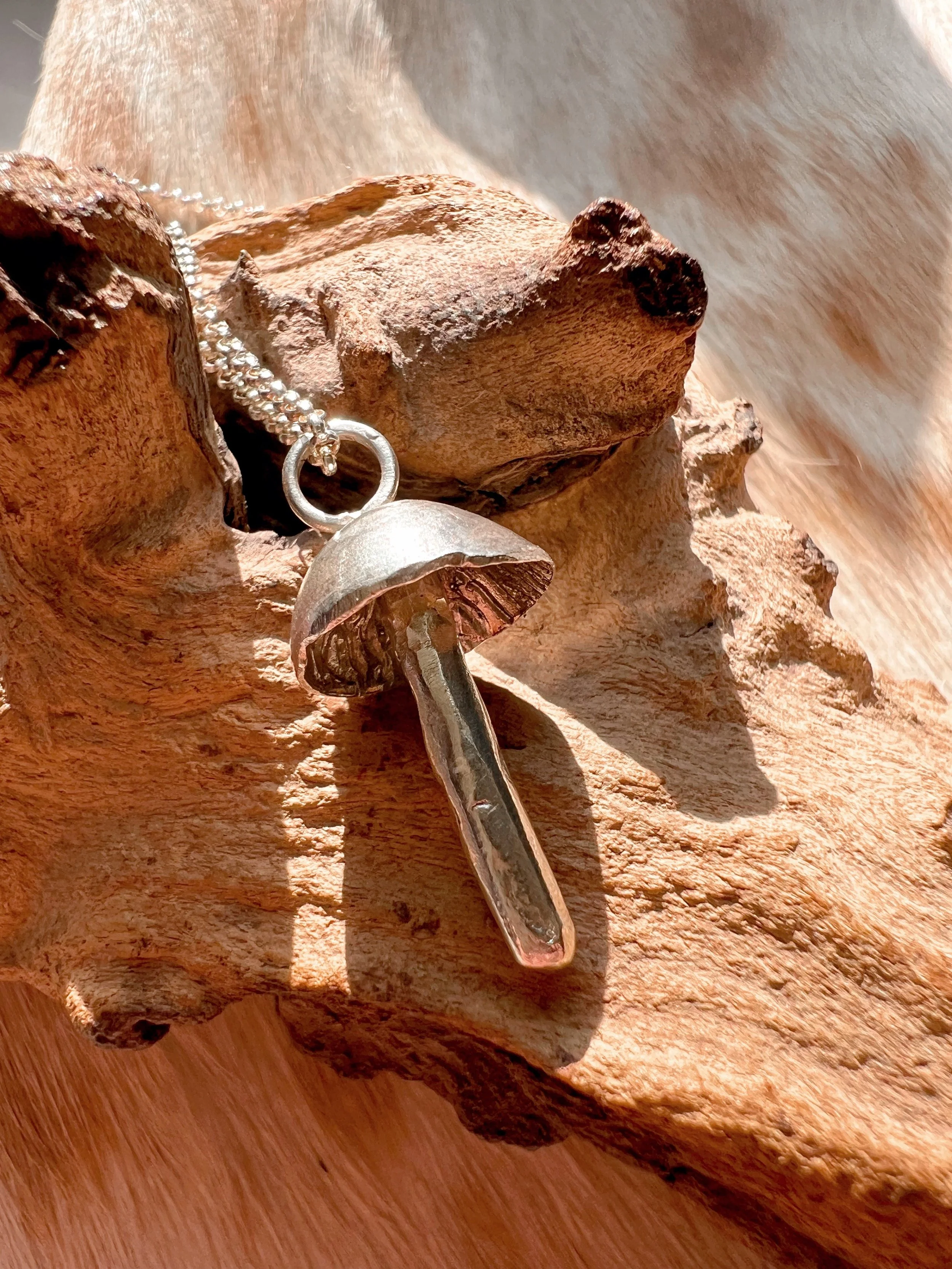 using recycled sterling silver to create a wild mushroom pendant