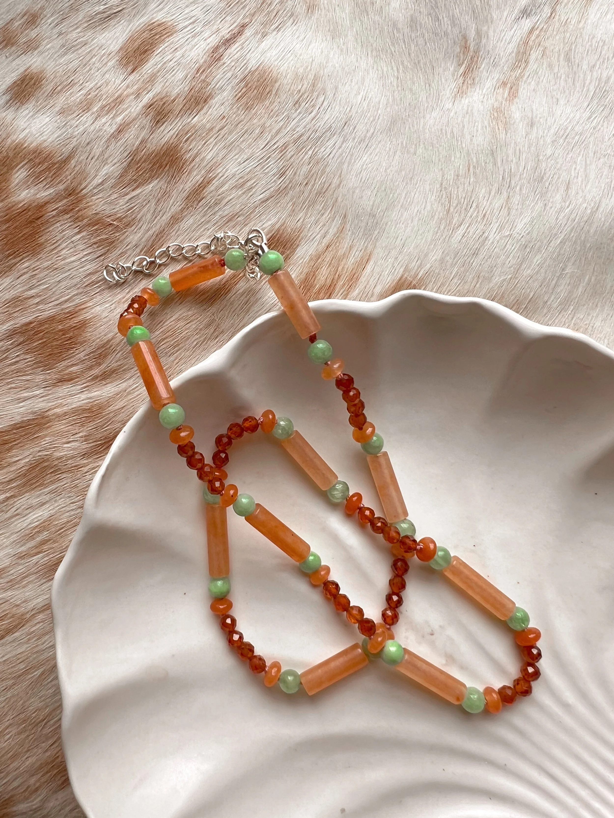 Hand-knotted necklace on pure silk featuring colorful gemstone beads