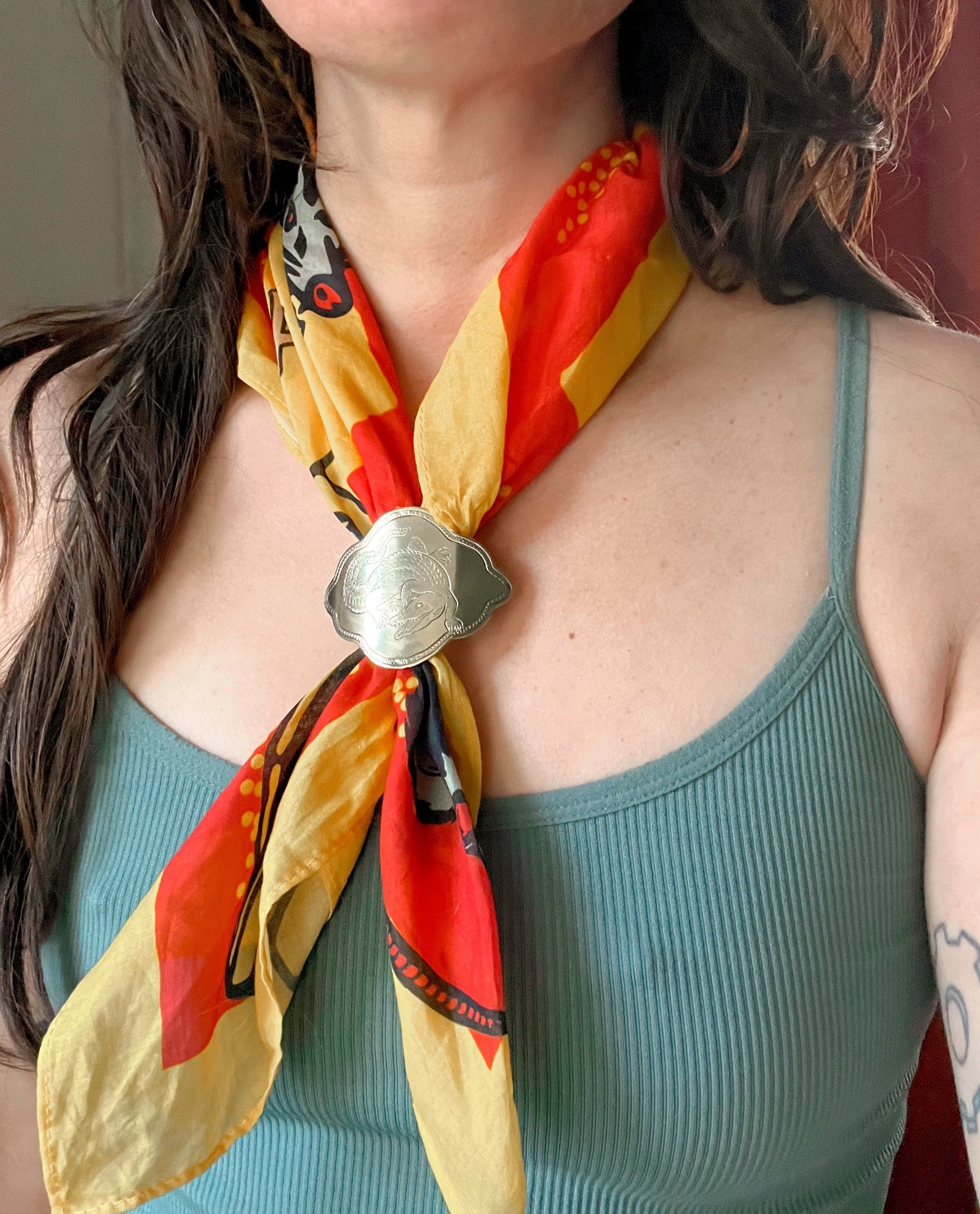 One-of-a-kind hand-engraved brass slide featuring an alligator