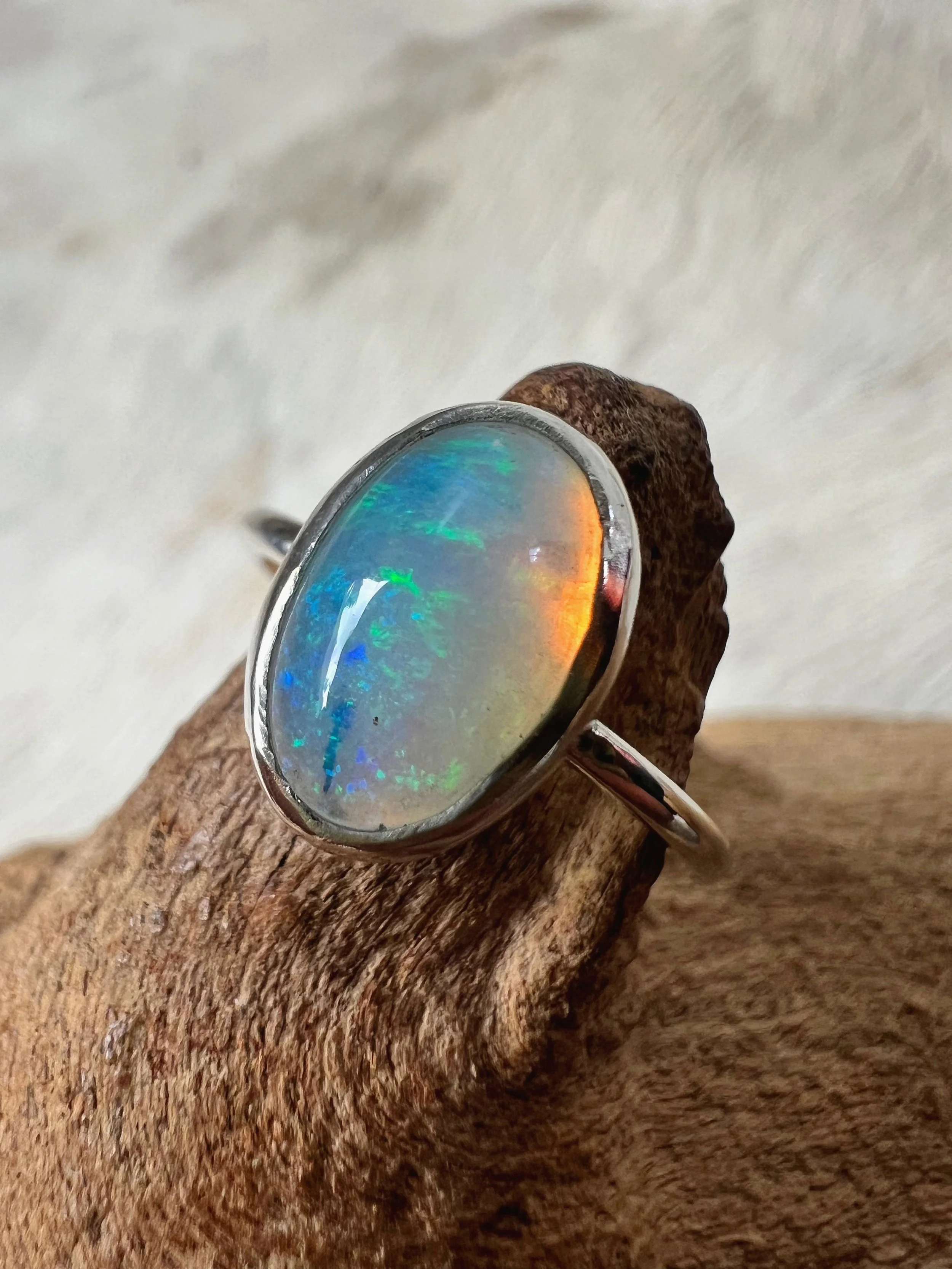 Opal and silver ring