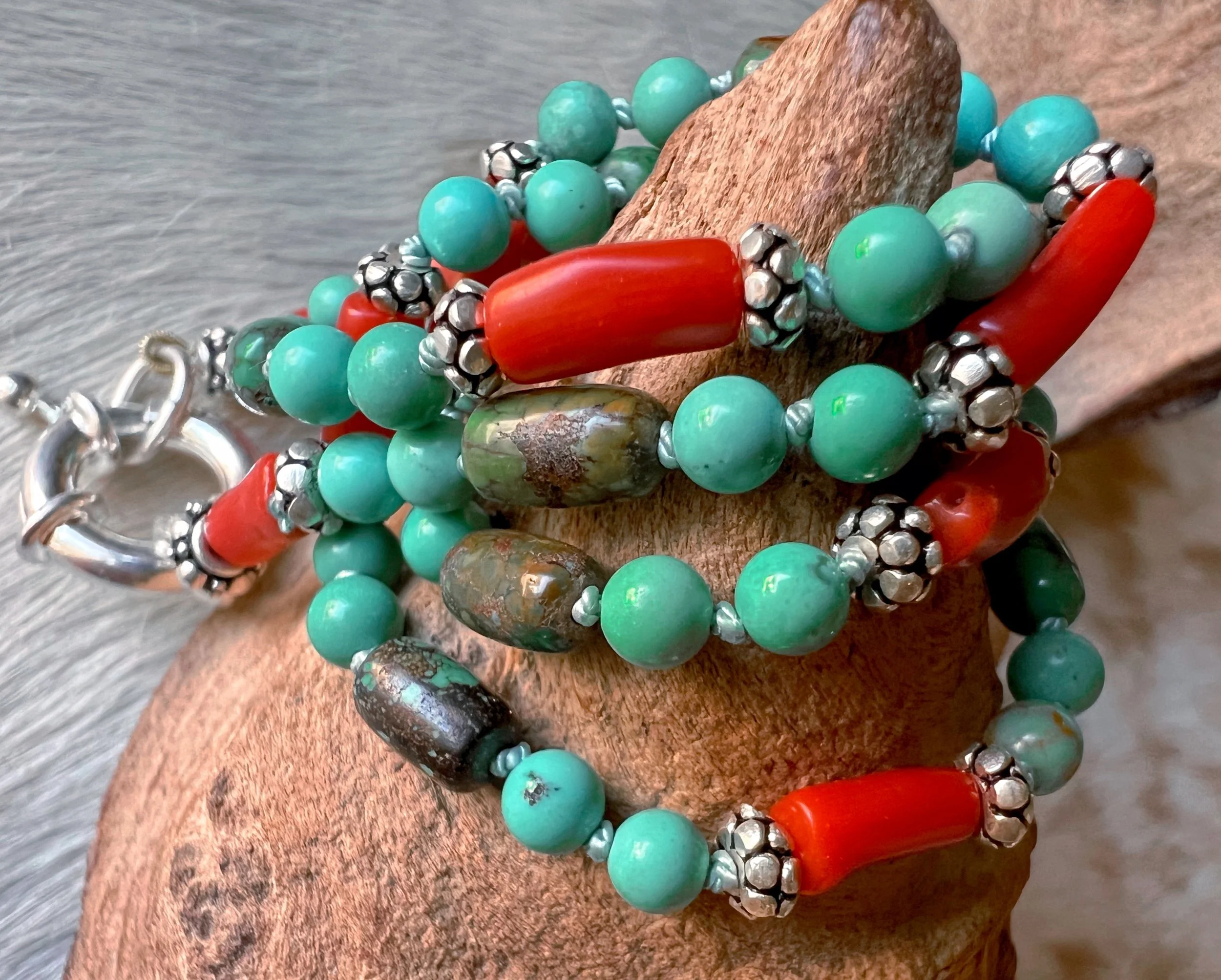 Hand-knotted necklace on pure silk featuring colorful gemstone beads