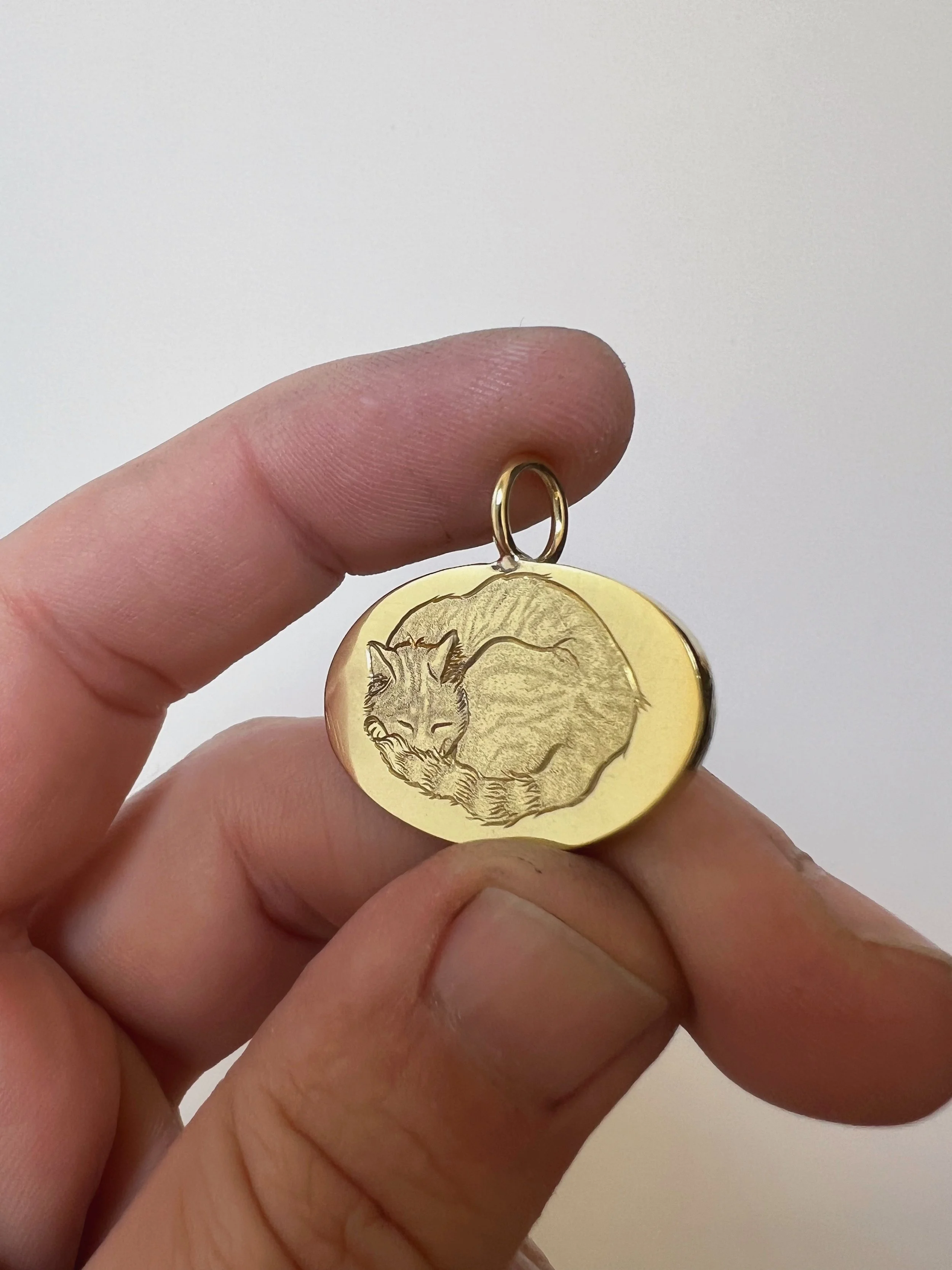 hand engraved cat pendant