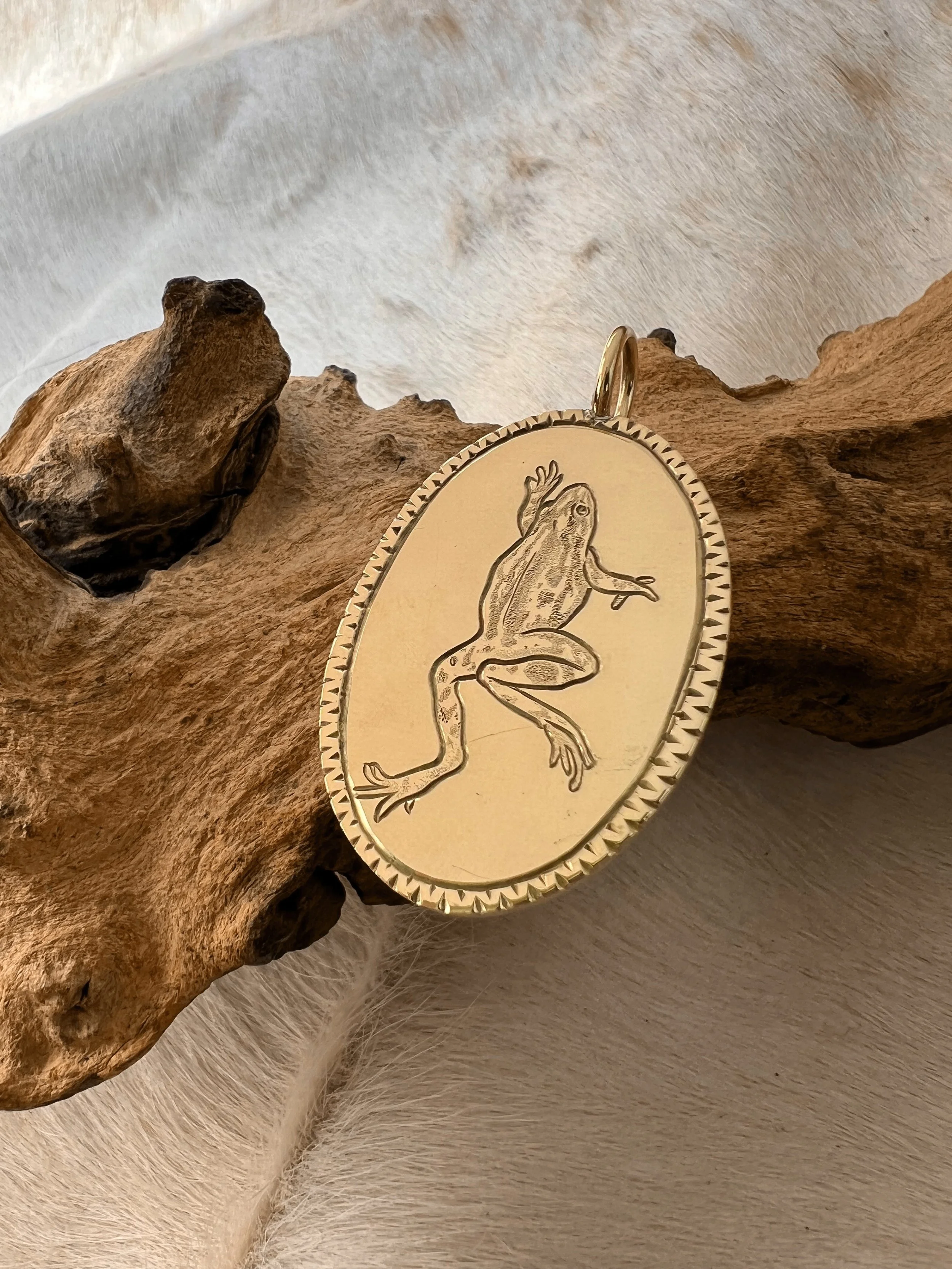 Engraved frog pendant