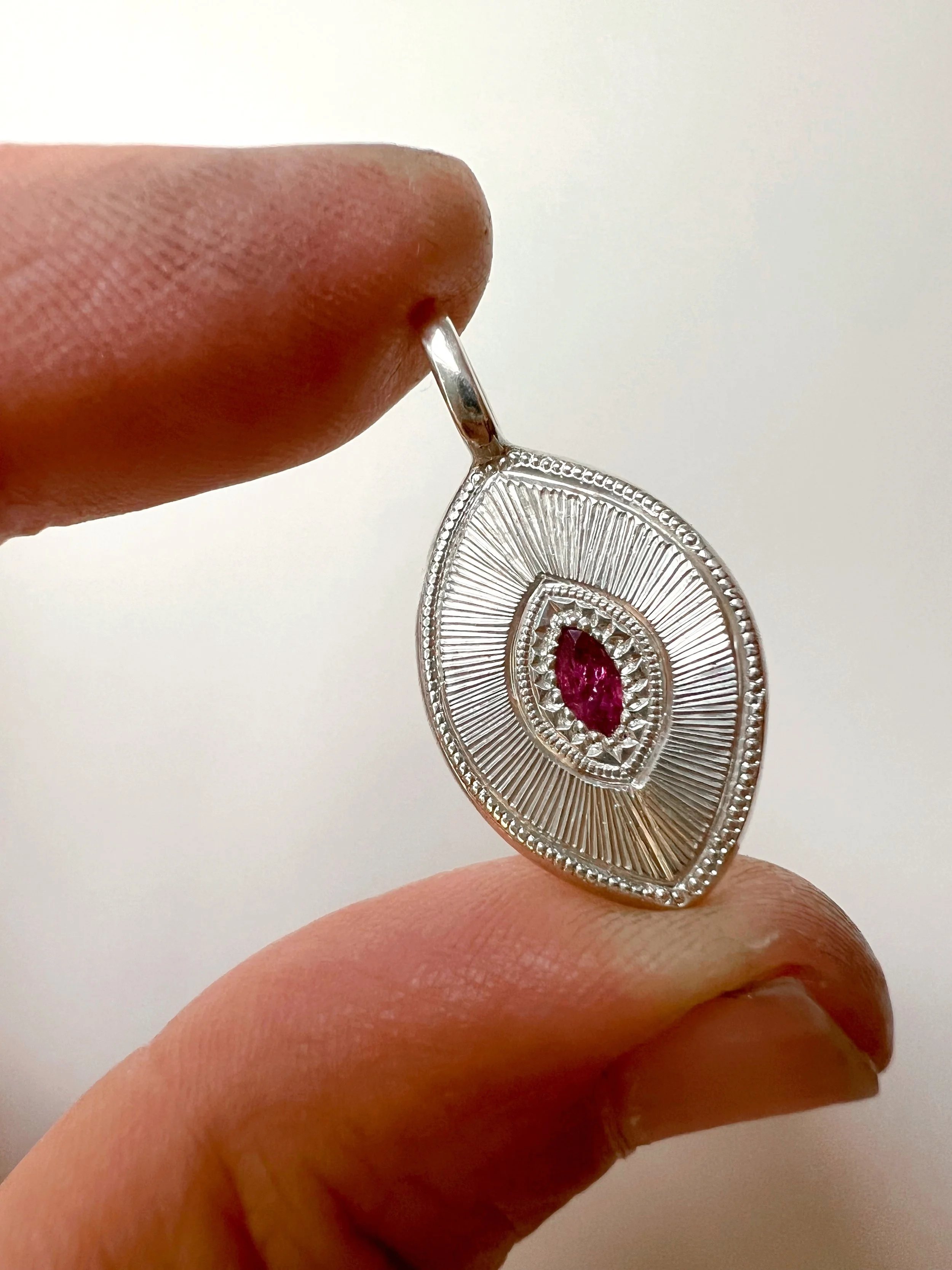 Silver and Ruby hand, engraved pendant
