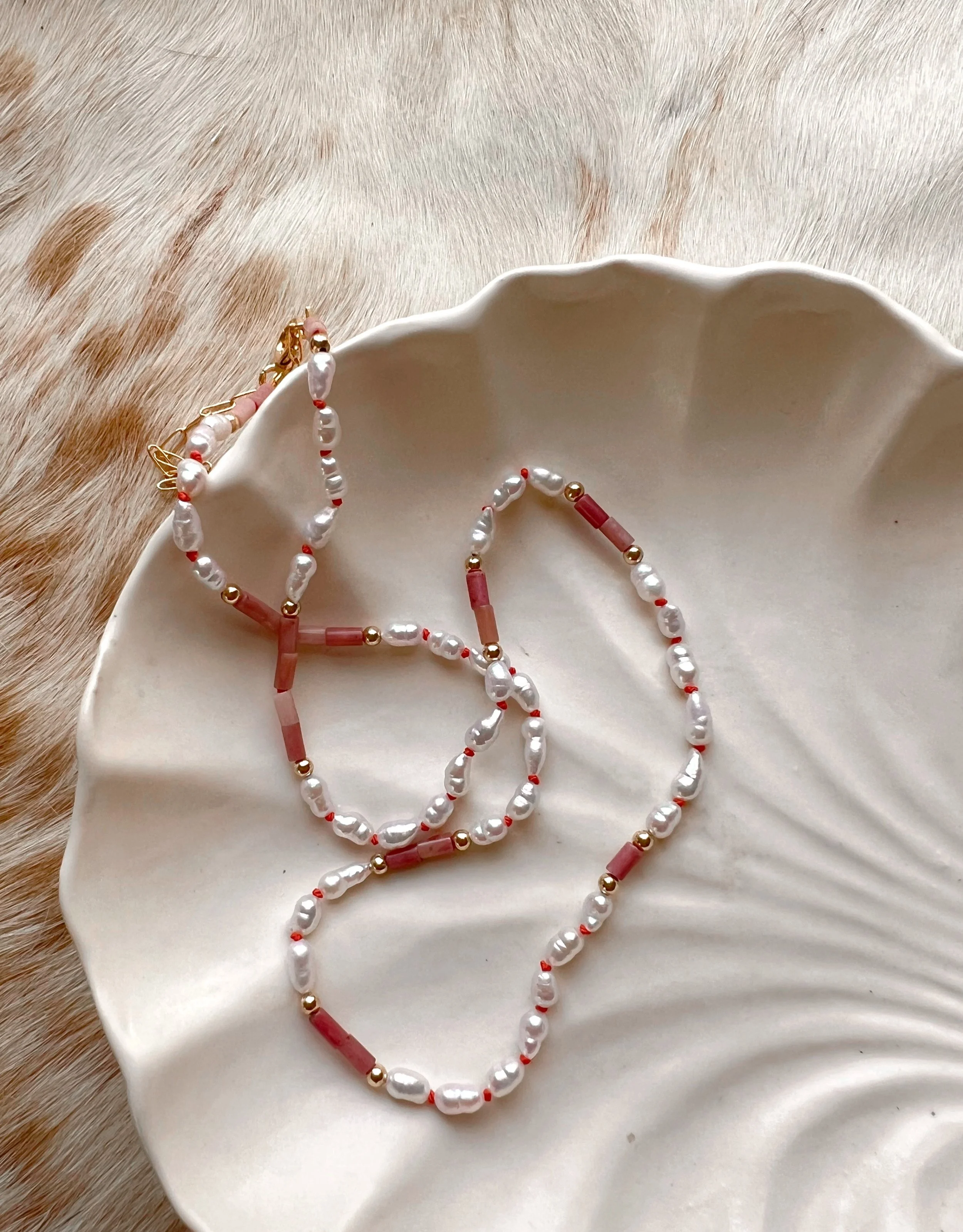 Hand-knotted necklace on pure silk featuring colorful gemstone beads