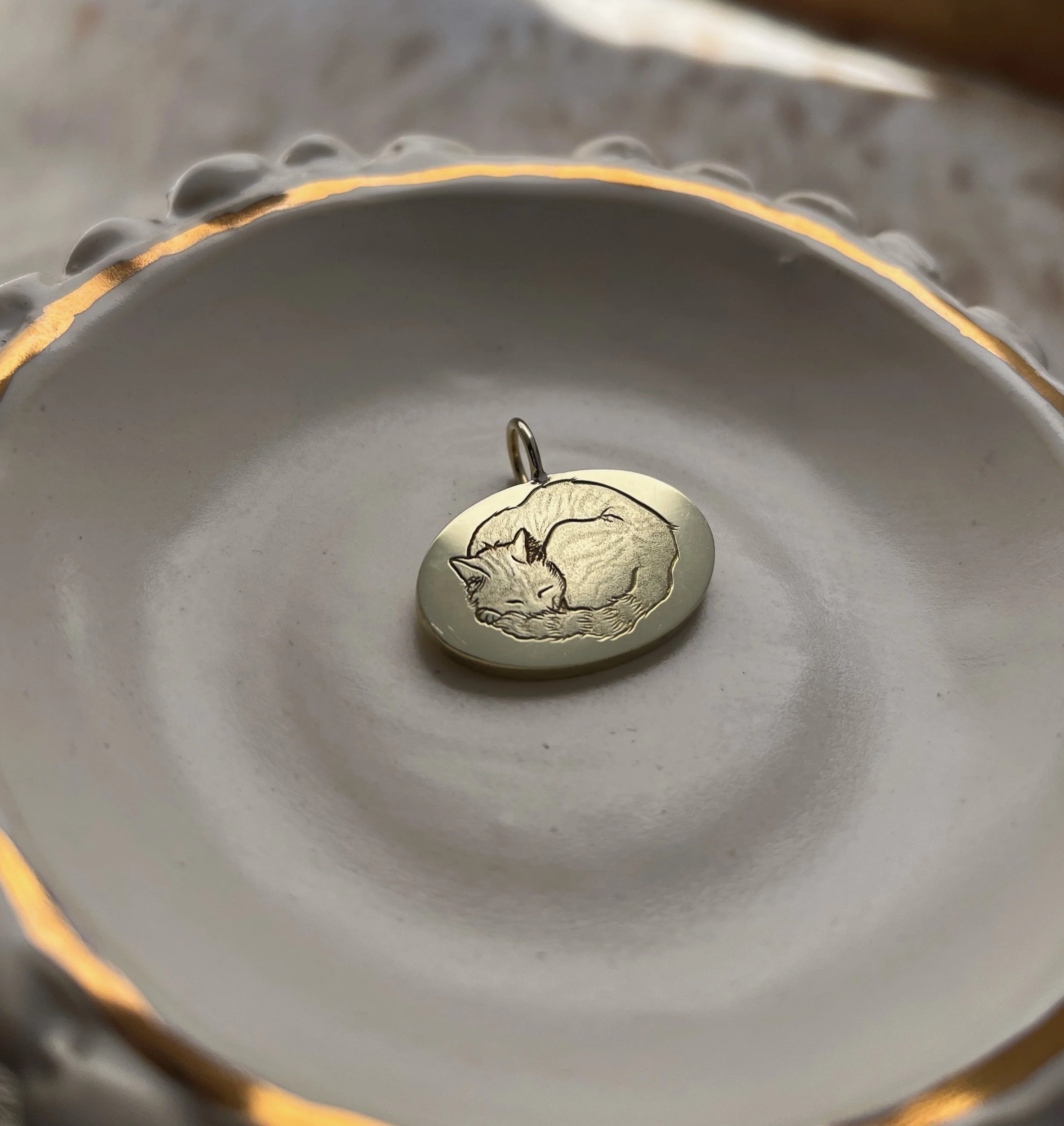 hand engraved cat pendant