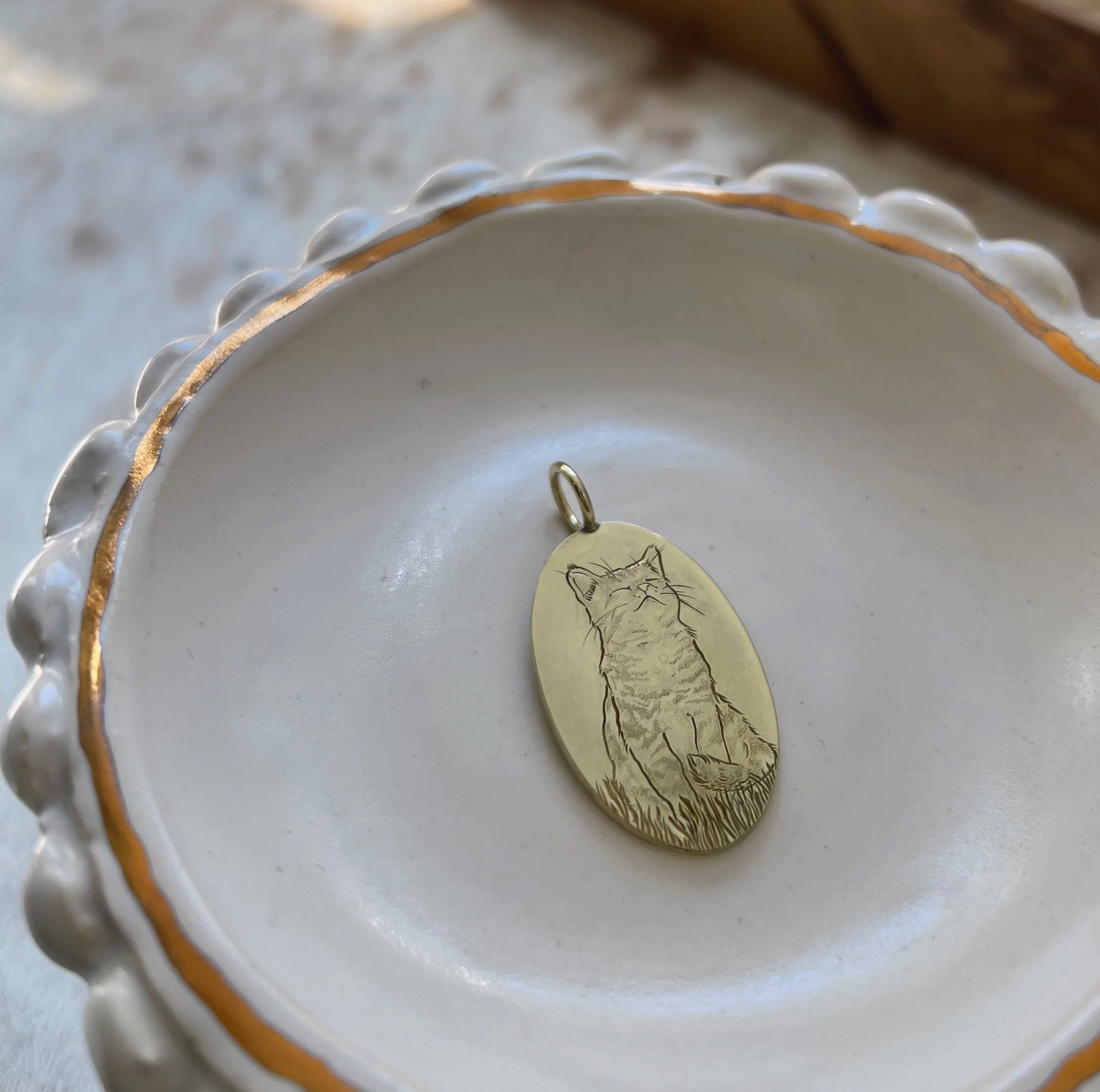 hand engraved cat pendant