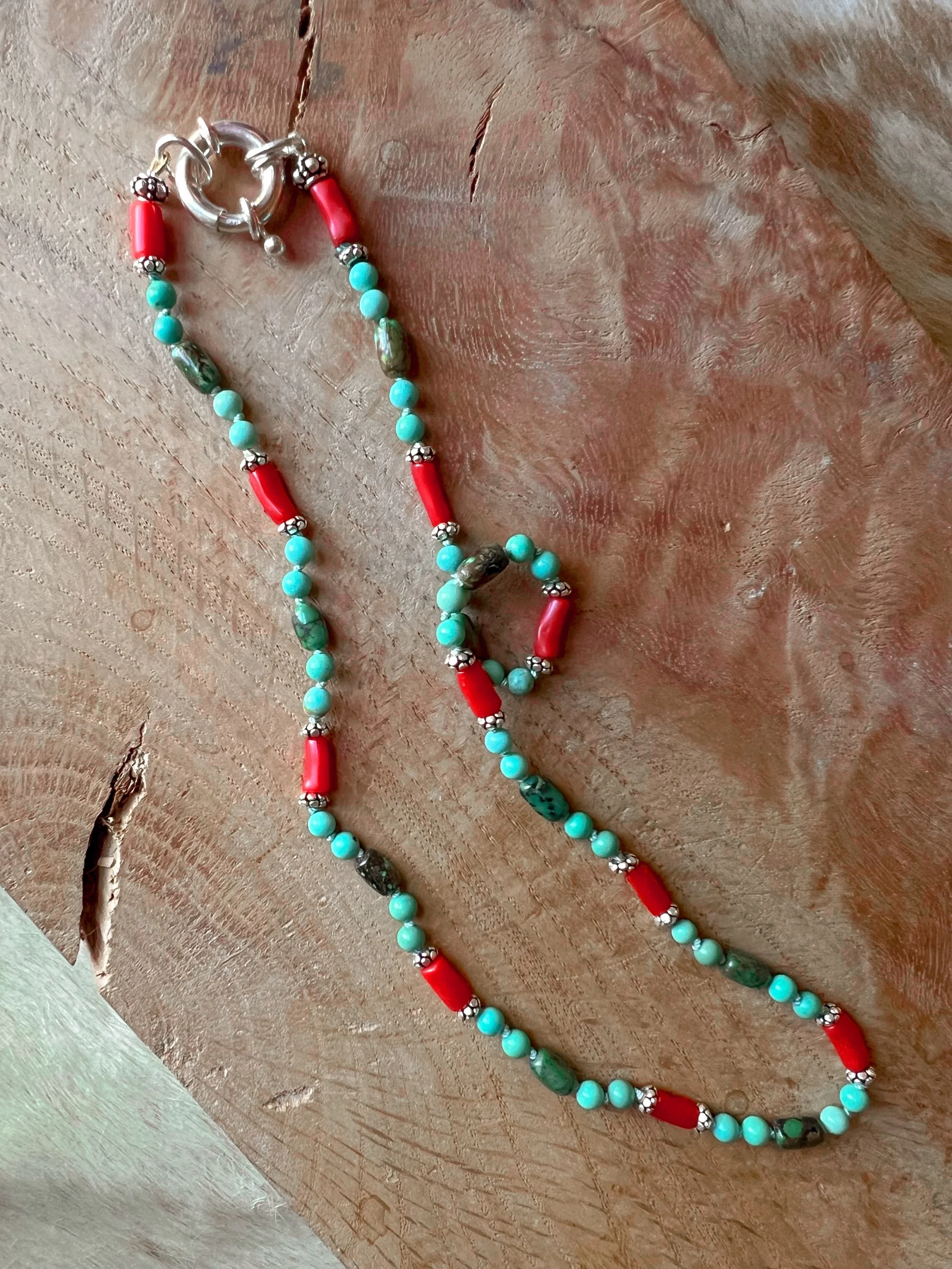 Hand-knotted necklace on pure silk featuring colorful gemstone beads