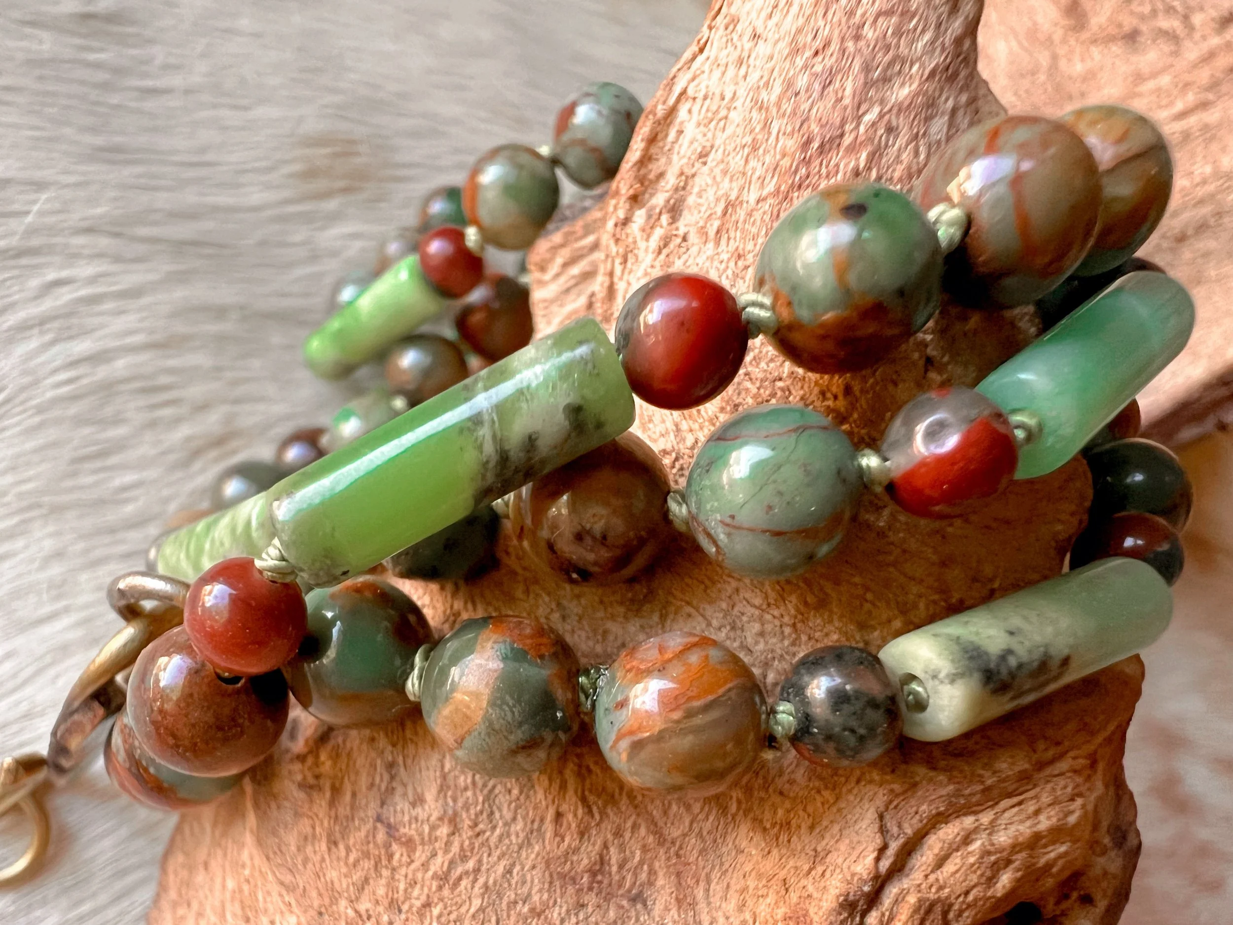 Hand-knotted necklace on pure silk featuring colorful gemstone beads