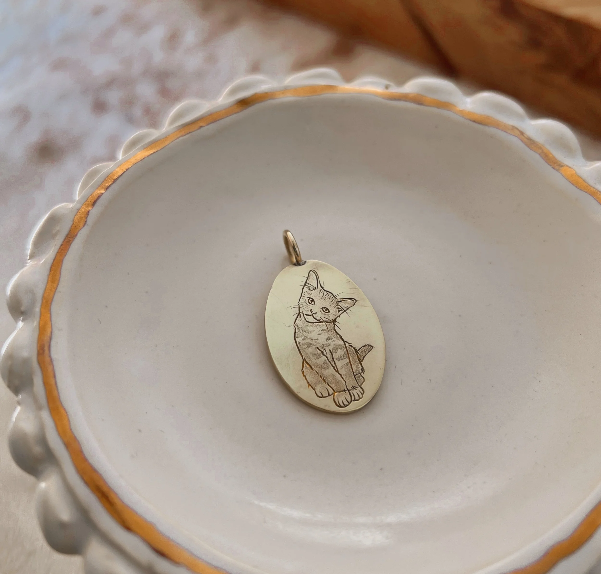 hand engraved cat pendant