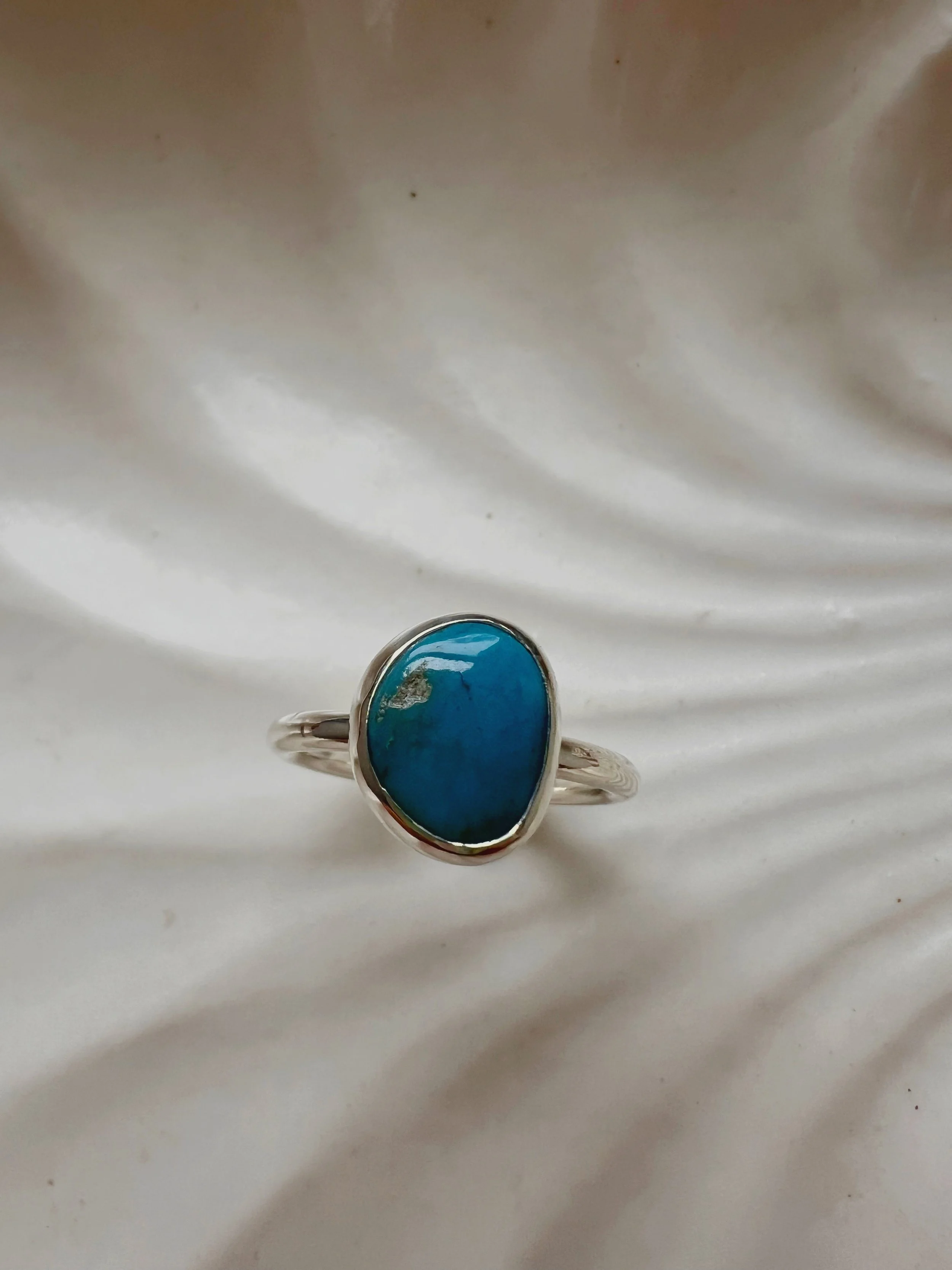 american turquoise stone set in a silver ring