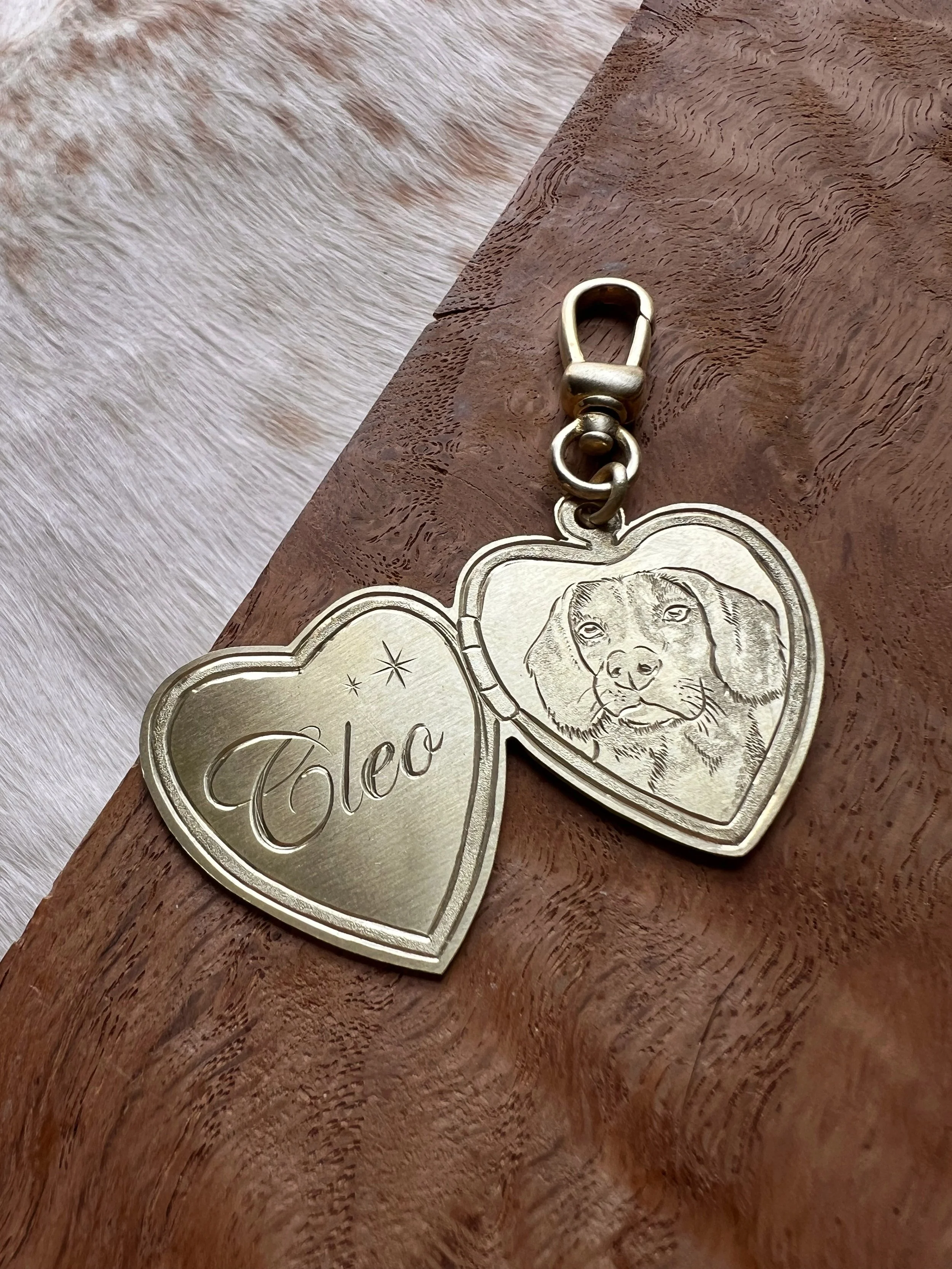 Customized brass "locket" with a detailed pet portrait engraving and script name