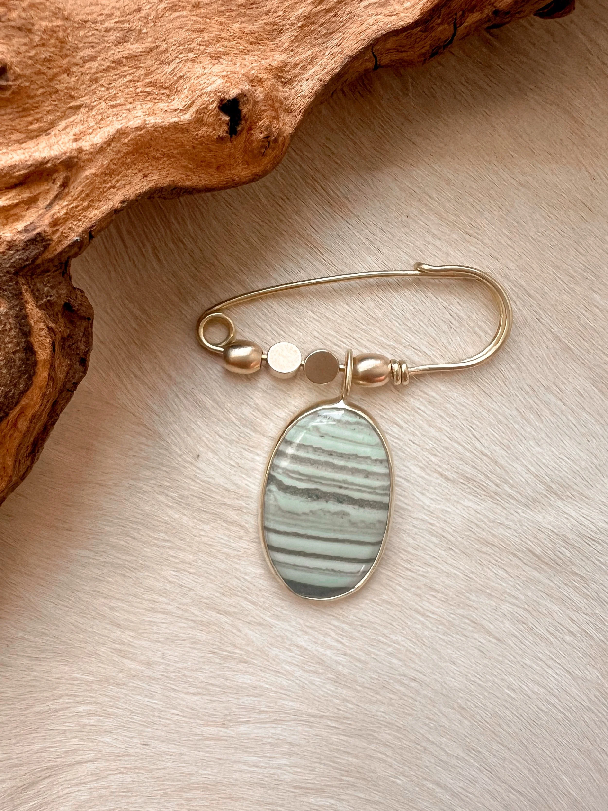 Saturn Chalcedony Pin