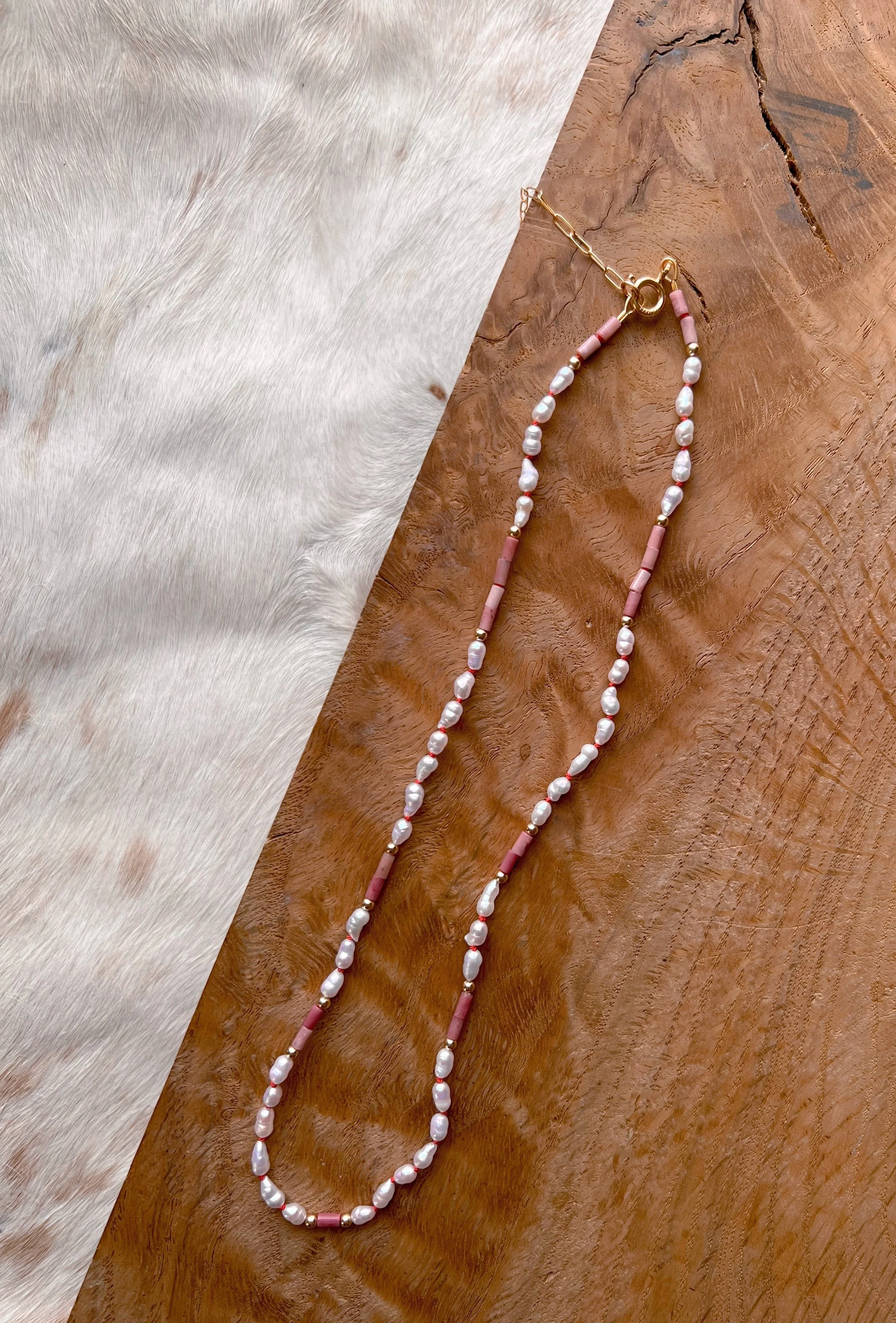 Hand-knotted necklace on pure silk featuring colorful gemstone beads