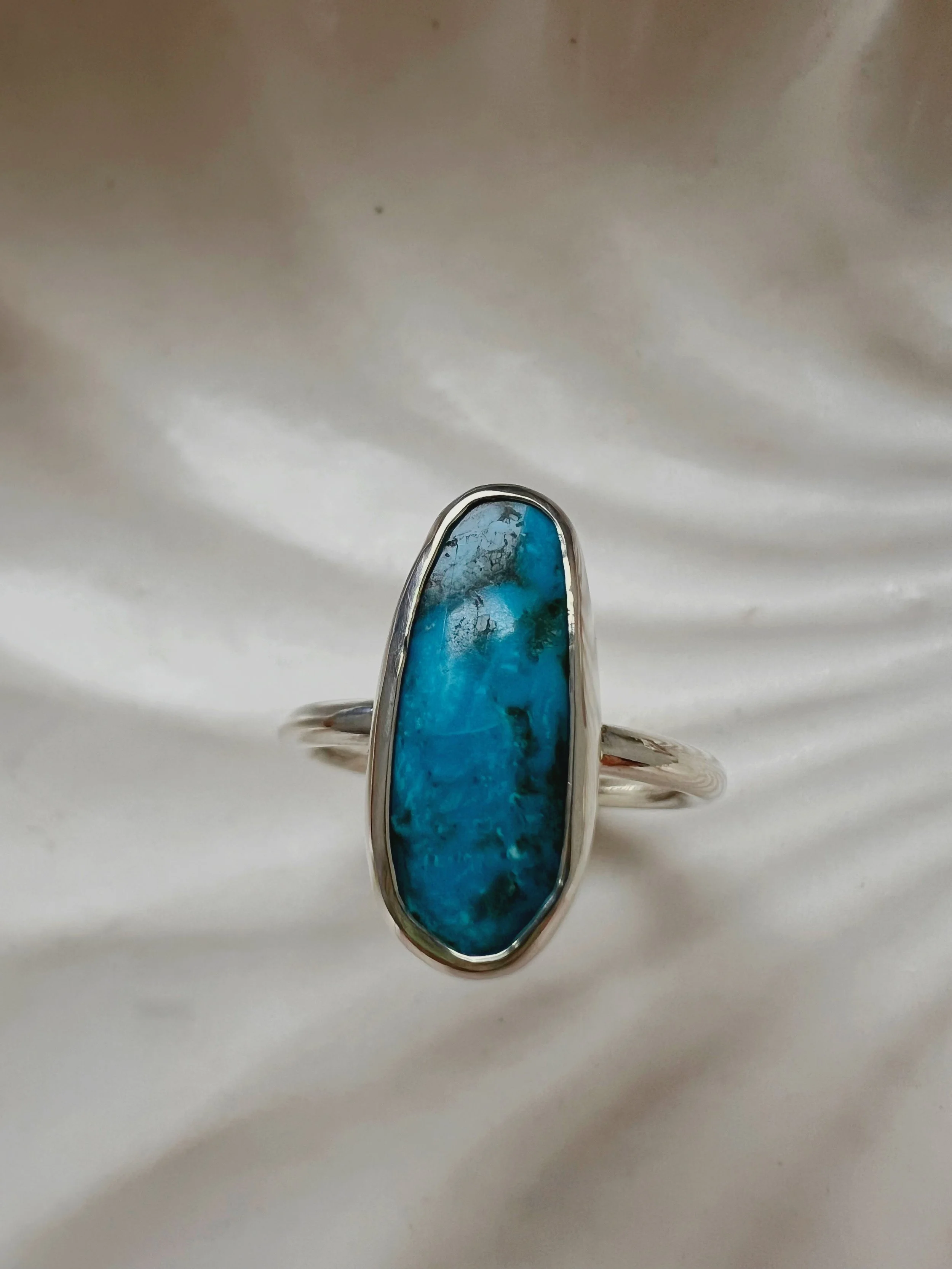 american turquoise stone set in a silver ring