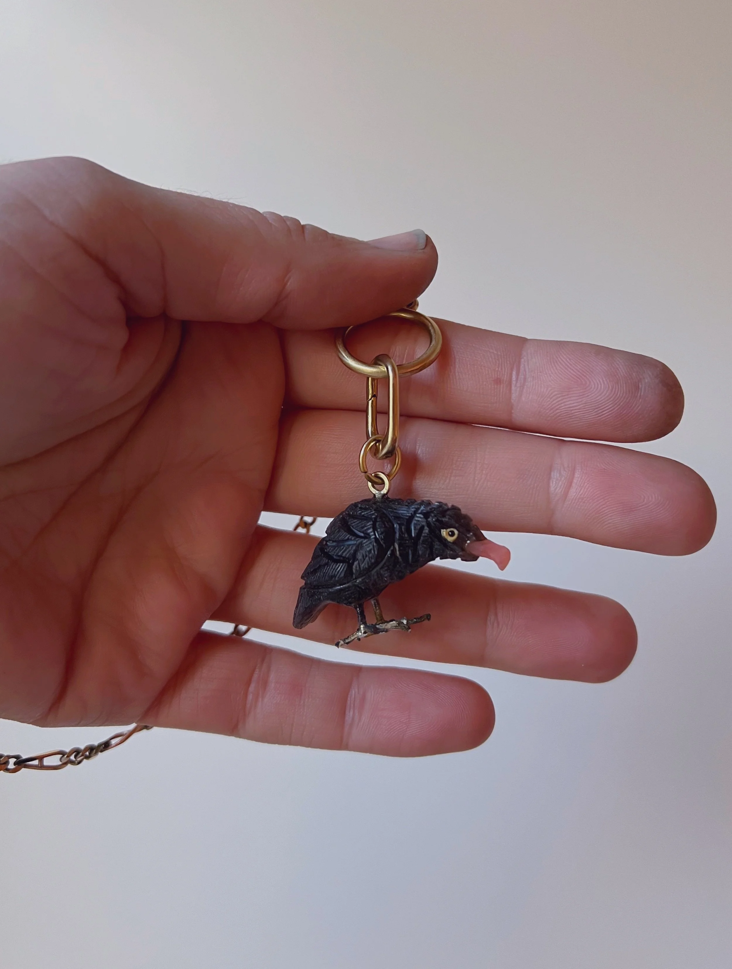 vintage gemstone carved bird pendant