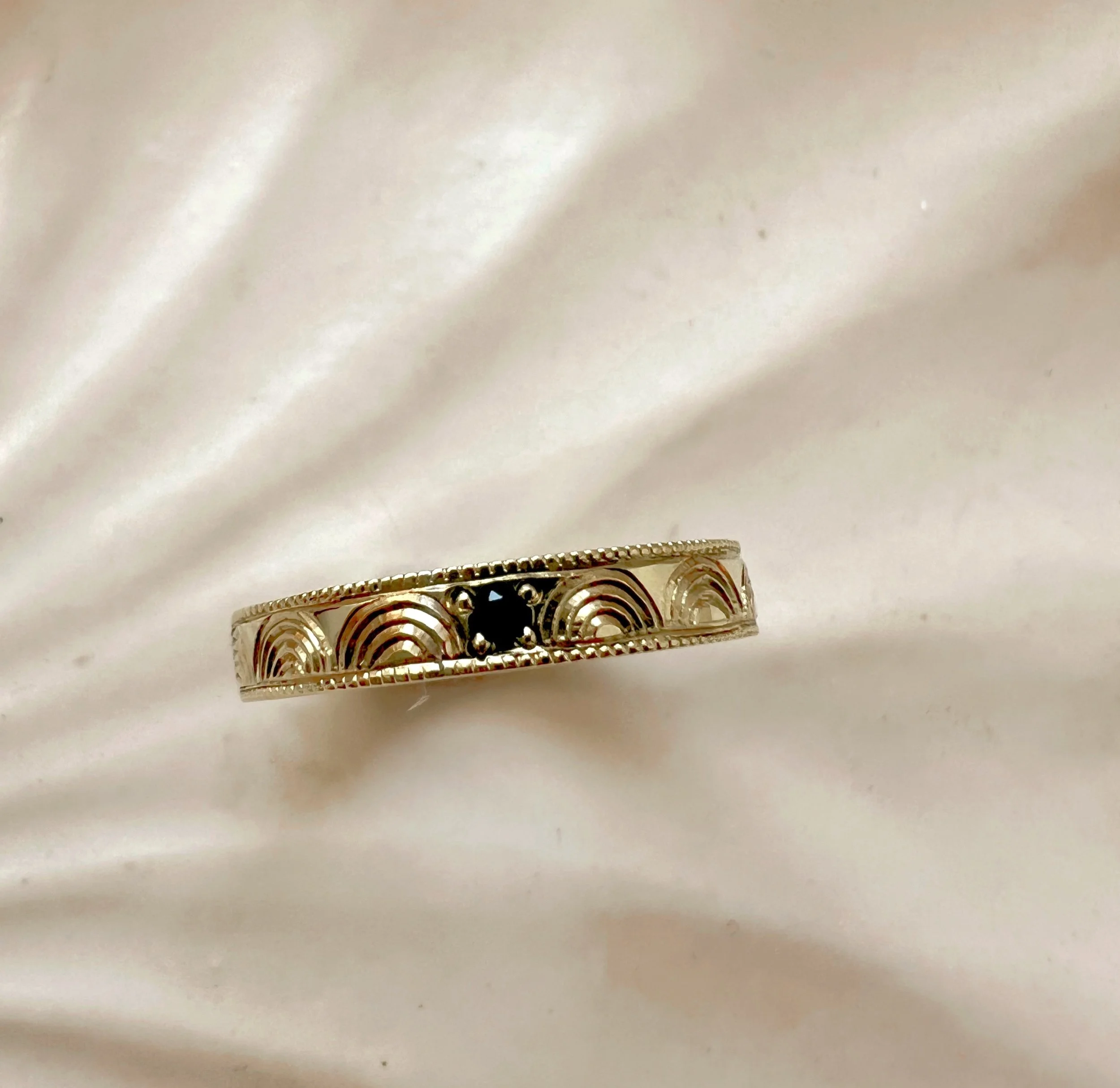 hand engraved ring with onyx stone