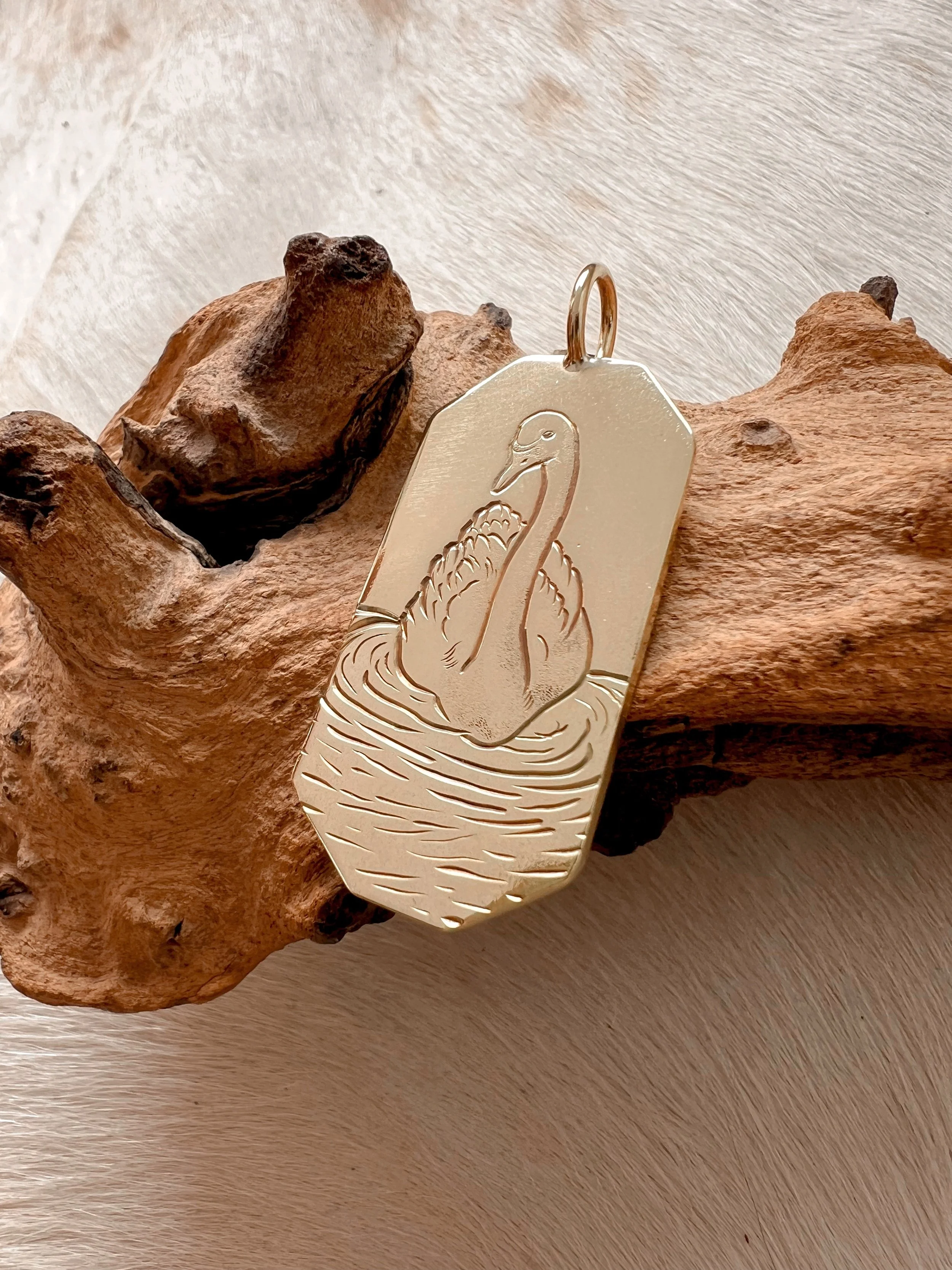 Engraved swan pendant