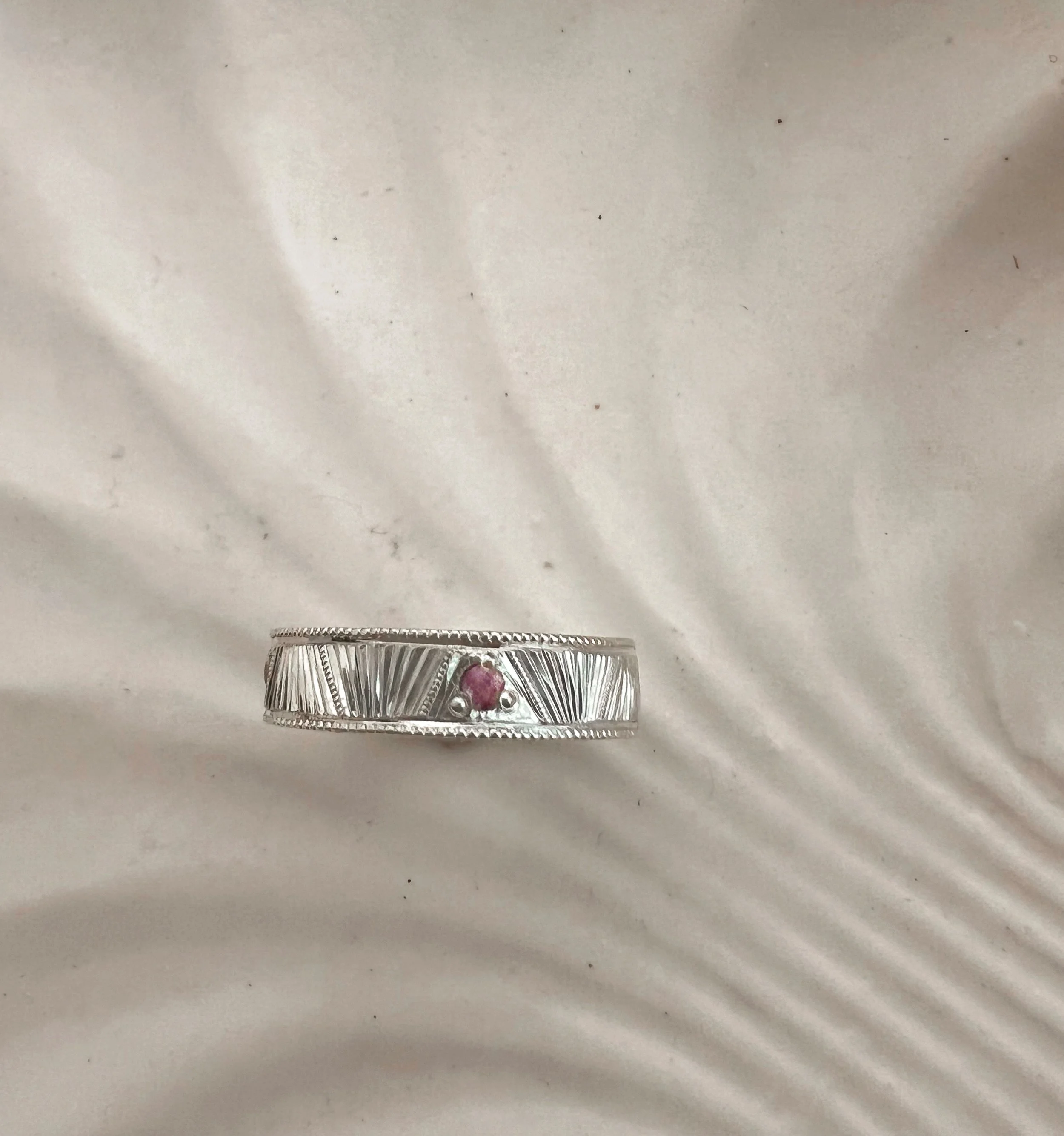 hand engraved silver & sapphire band