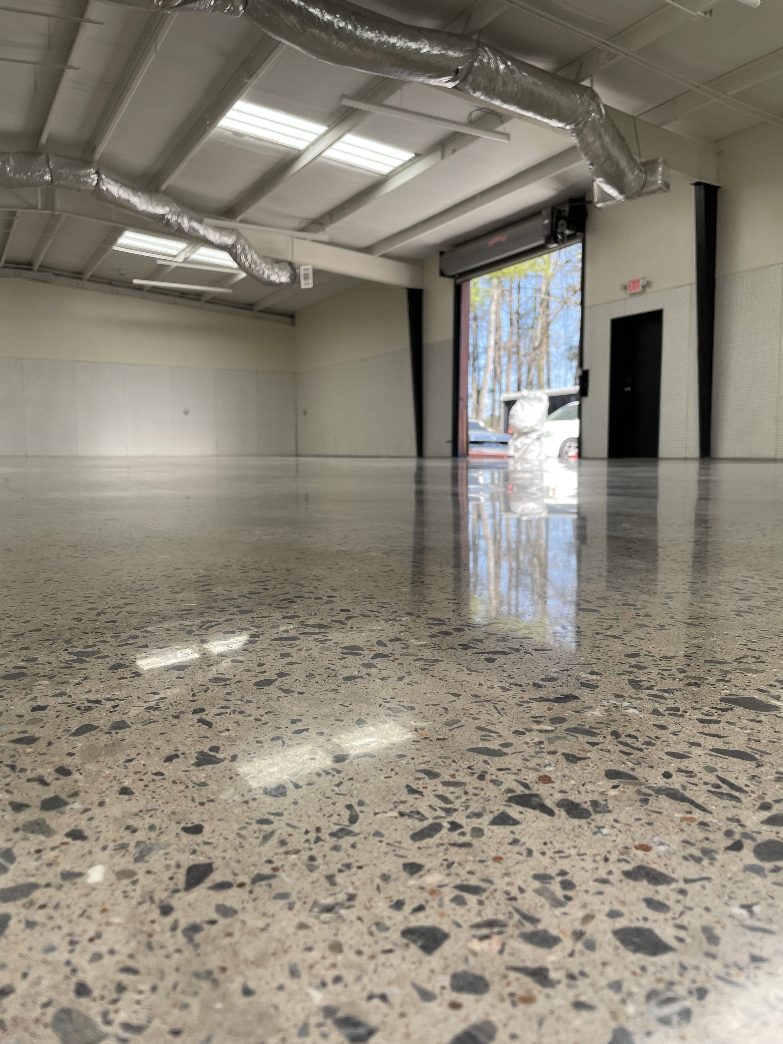 Polished-Concrete-Floor-Aggregate-Exposure-Grindkings-Flooring.jpeg