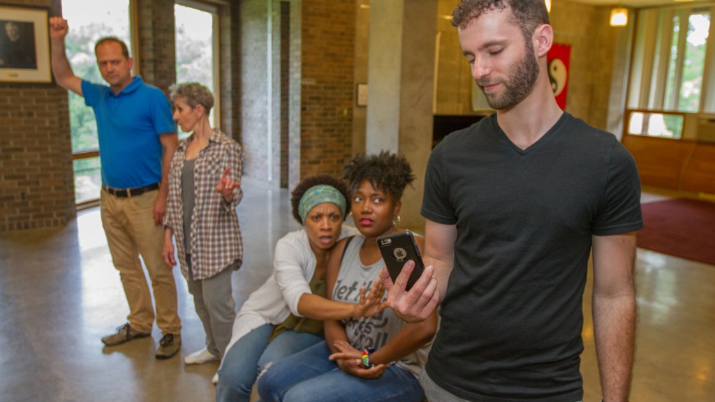 Performance Educators on a “subway,” using Image Theatre to explore bystander intervention