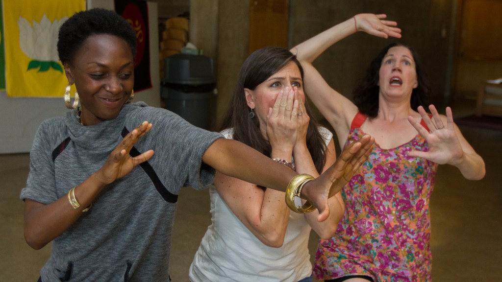 Impact performance educators using “Fluid Sculptures” to play back a program participant’s story.