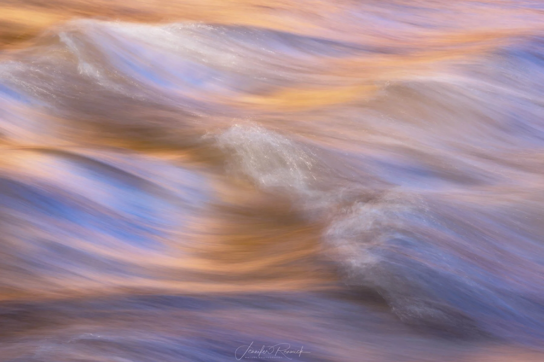 Brushed / Jennifer Renwick / A slower shutter speed captures the colors and textures of the creek, the blue from the sky, and the orange from the reflected canyon light