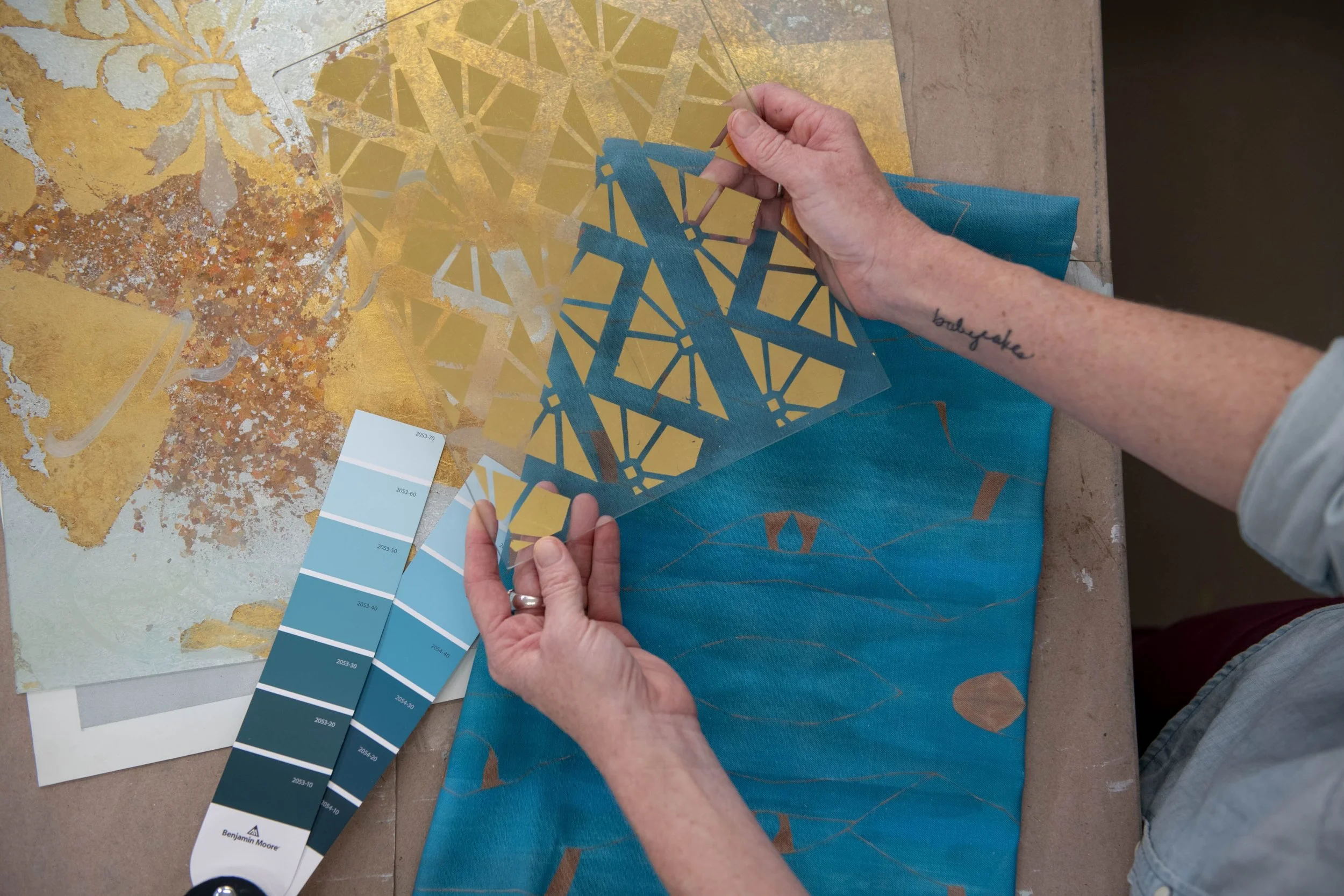 Coordinating finishes, fabrics, and paint swatches.