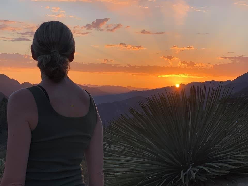 Watching the sun set over the mountains in Los Angeles.