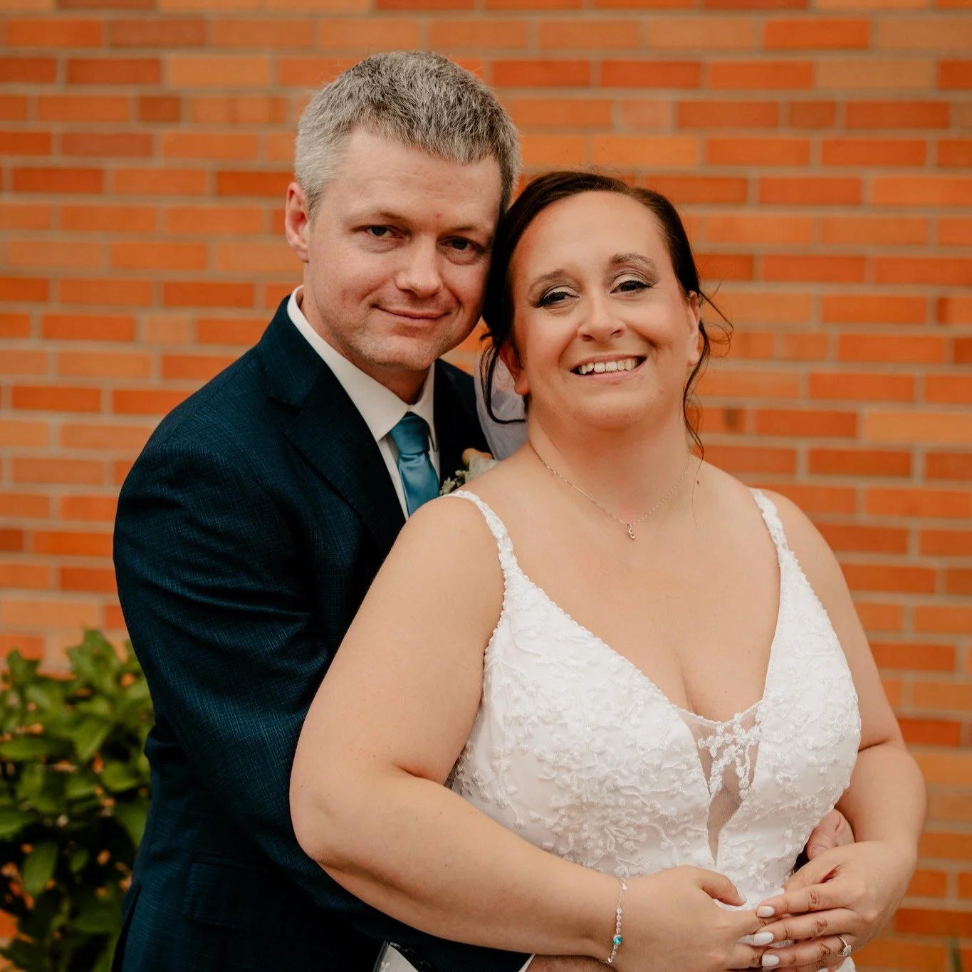 Tess &amp; Kyle,

I am wishing you years of happiness full of cheering on the Jacks, celebrating milestones with family, and spoiling your dog rotten! 

Thanks for letting me photograph your wedding day!