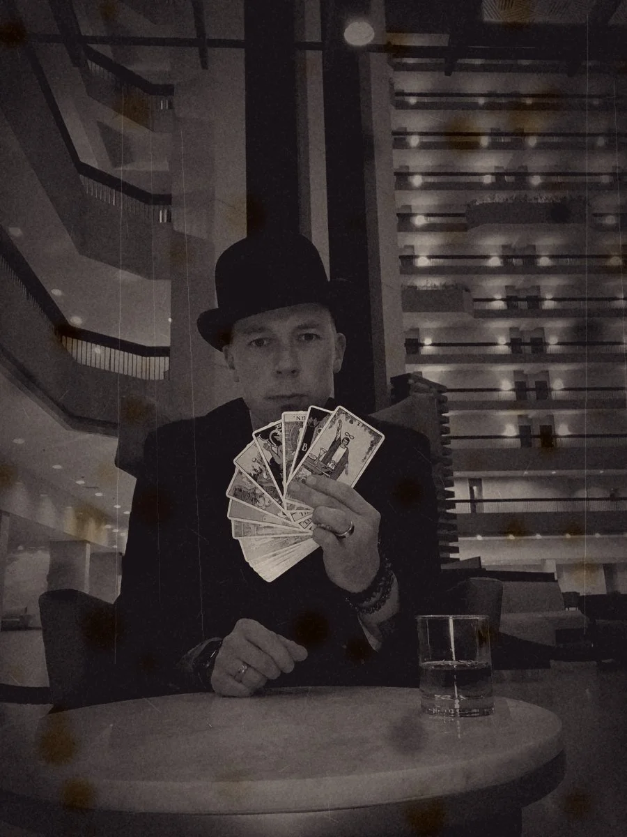 Nolan fanning a deck of tarot cards
