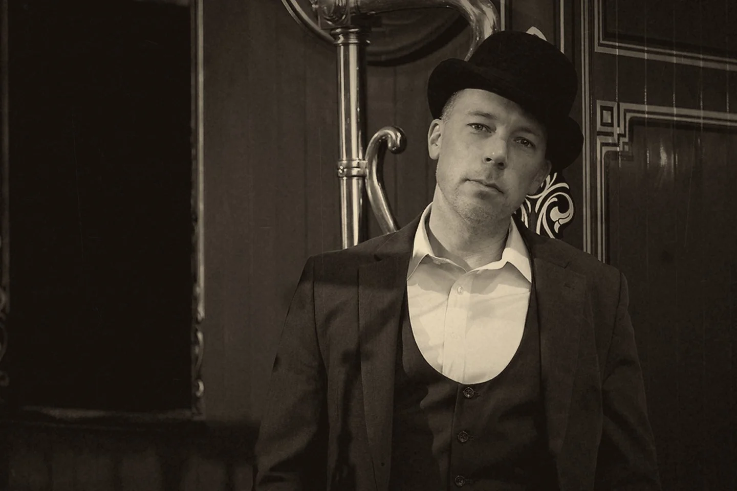 Nolan in a bowler hat