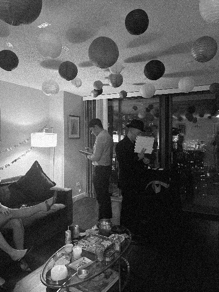 Nolan performing in a living room