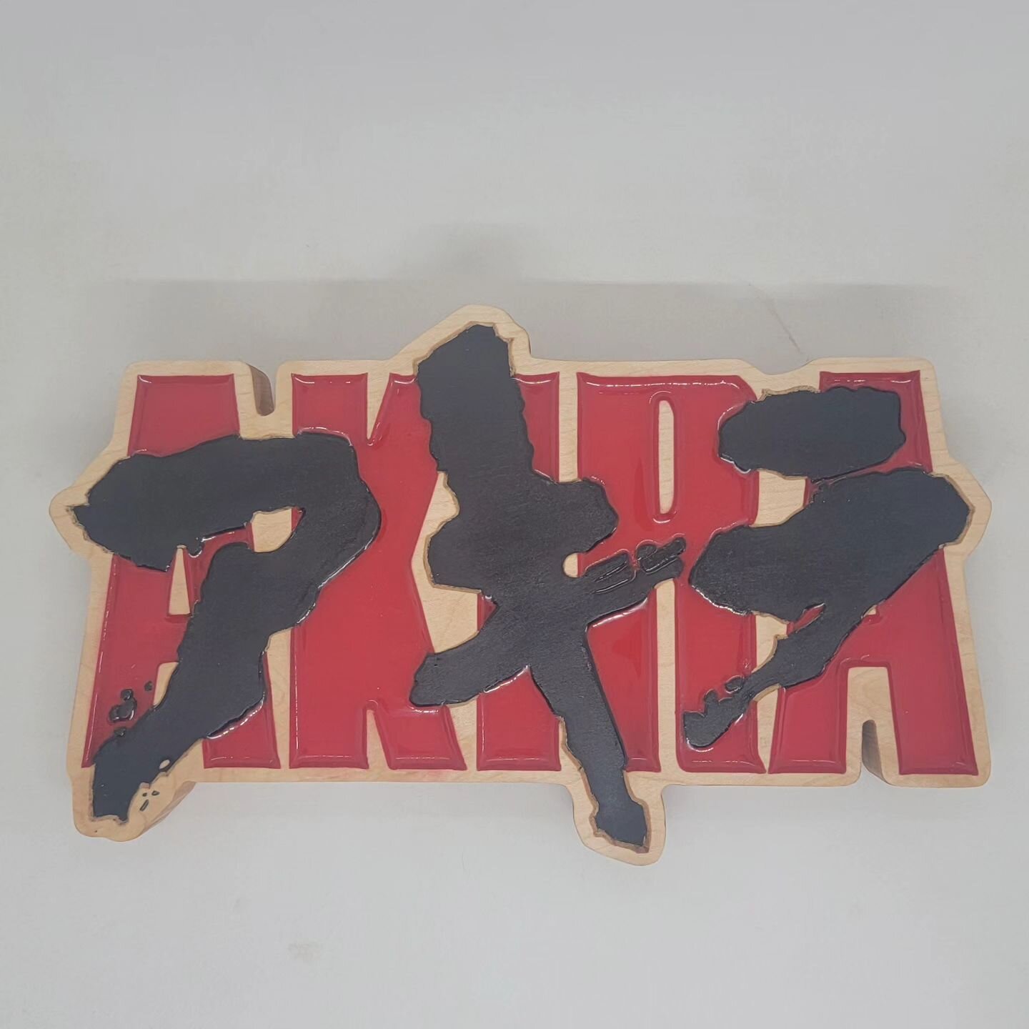 I'm super happy with how this turned out! Akira carving in maple with a super thin coat of epoxy on the red! 
&bull;
&bull;
&bull;
&bull;
&bull;
#carpentry #carving #new #smallshop #smallbusiness #custommade #custom #customsign #sign #maple #anime #a