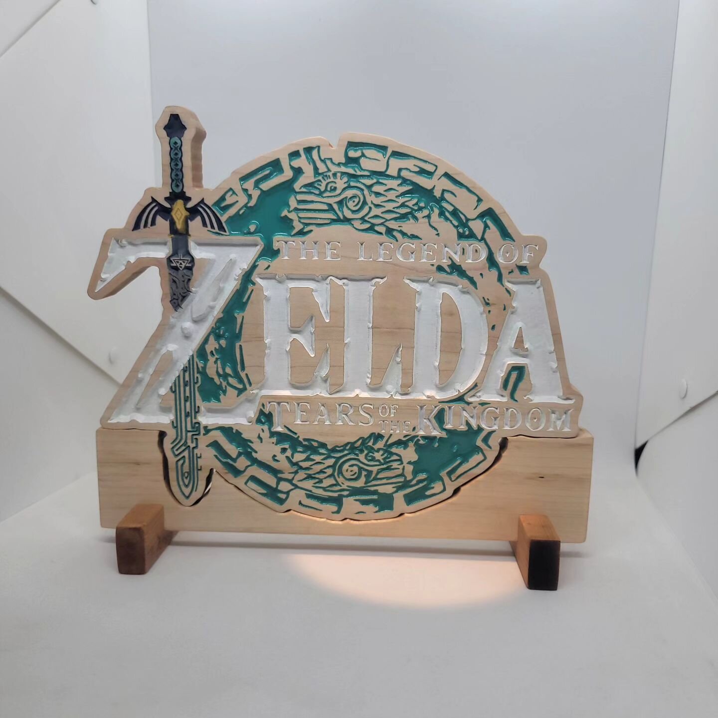 Made a stand for this sweet Zelda carving! 
&bull;
&bull;
&bull;
&bull;
&bull;
#carpentry #custommade #custom #customsign #sign #zelda #tearsofthekingdom #art #new #hardwood #woodart #carving #smallshop #gaming #nintendo