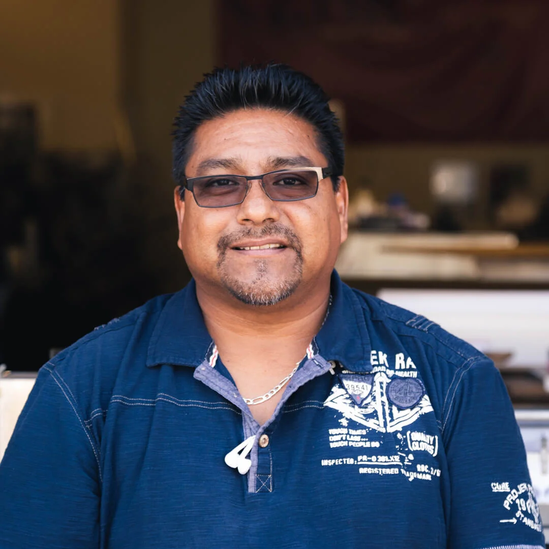 JUAN All the way from Mexico City, Mexico, Juan is our master of foil. Juan is a wizard when it comes to locking down tough registration and getting that beautiful, crisp foil coverage that our clients have come to expect from us. Outside of the shop he enjoys running and going to the gym. Pantone: PMS 135U Font: Calafia Paper: Gmund Bier Papier Ale