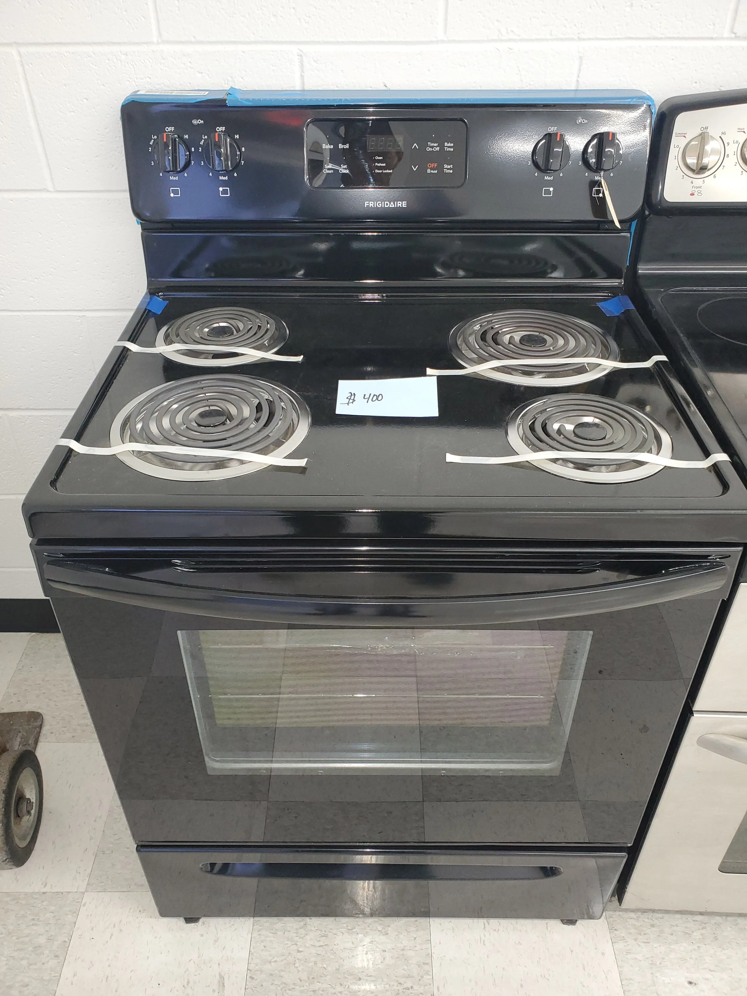 New Frigidaire Black Coil Stove — Mesquite Group