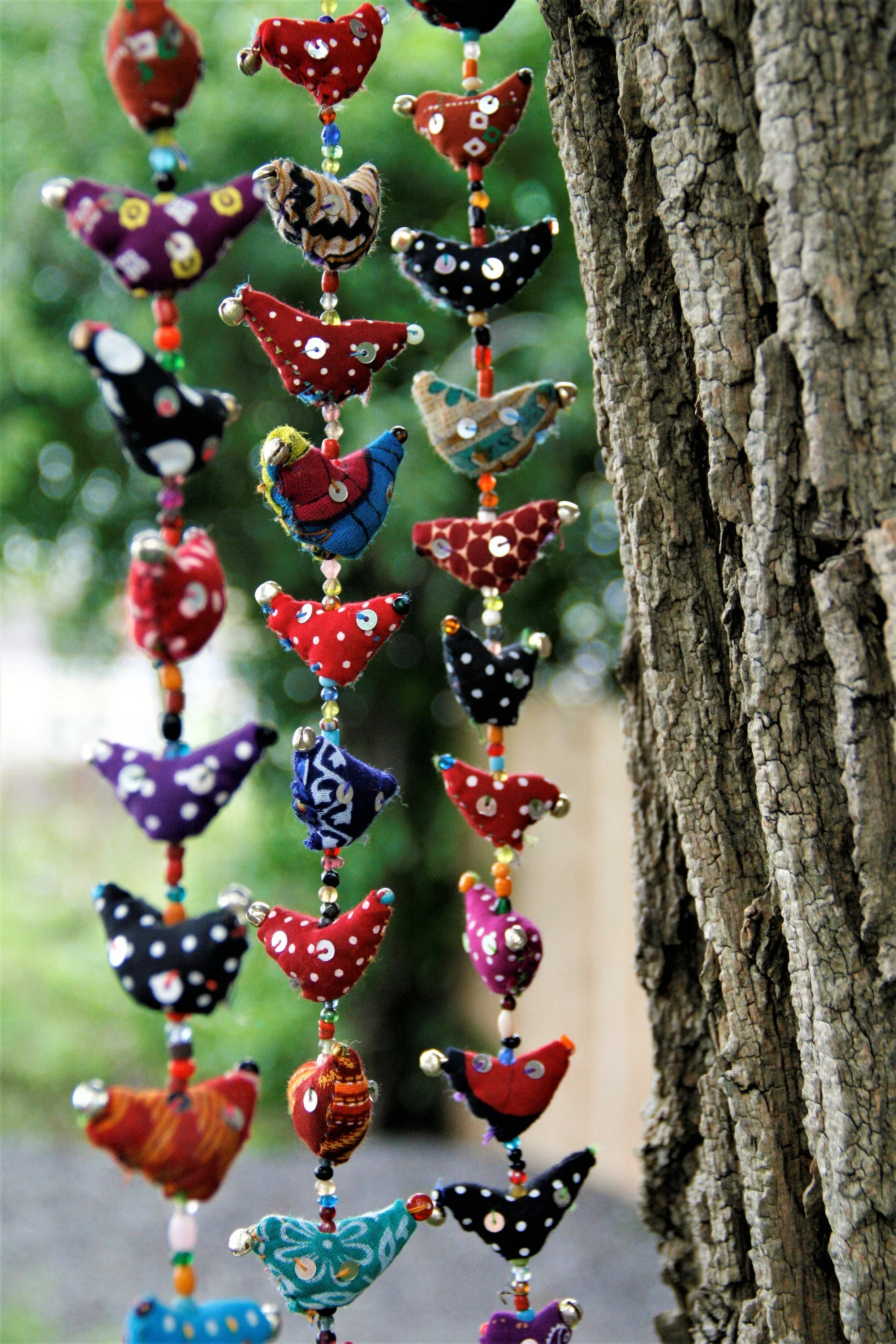 colorful prosperity hens hanging as Indian good luck decor
