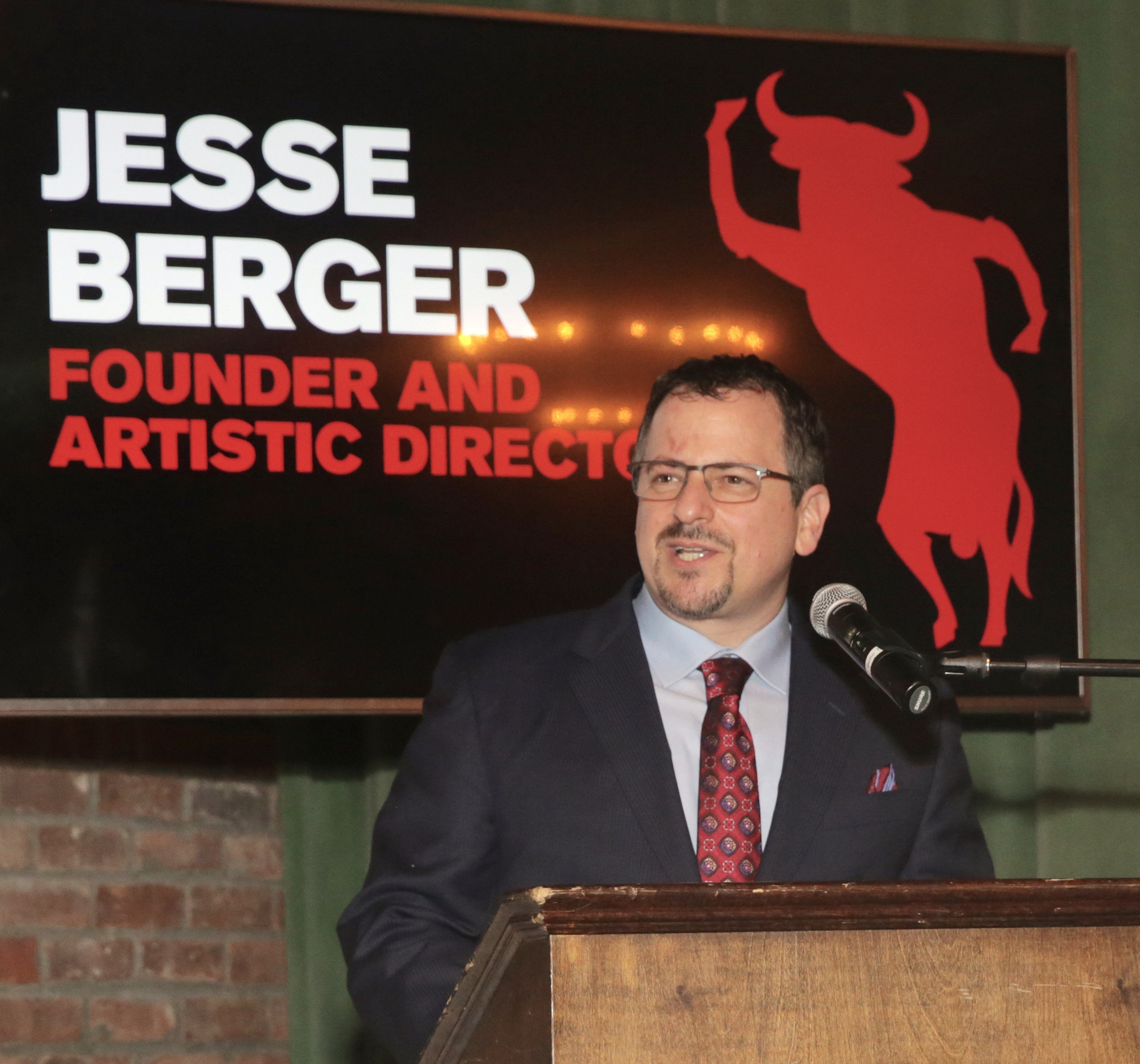 Jesse Berger (Founding Artistic Director) opens the Tenth Annual RUNNING OF THE RED BULLS Benefit   Photo credit: Mireya Acierto
